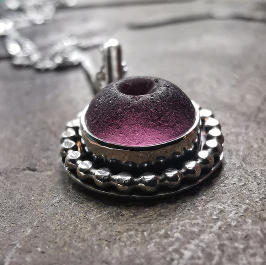 Tiny Scottish purple sea glass button & sterling silver pendant.