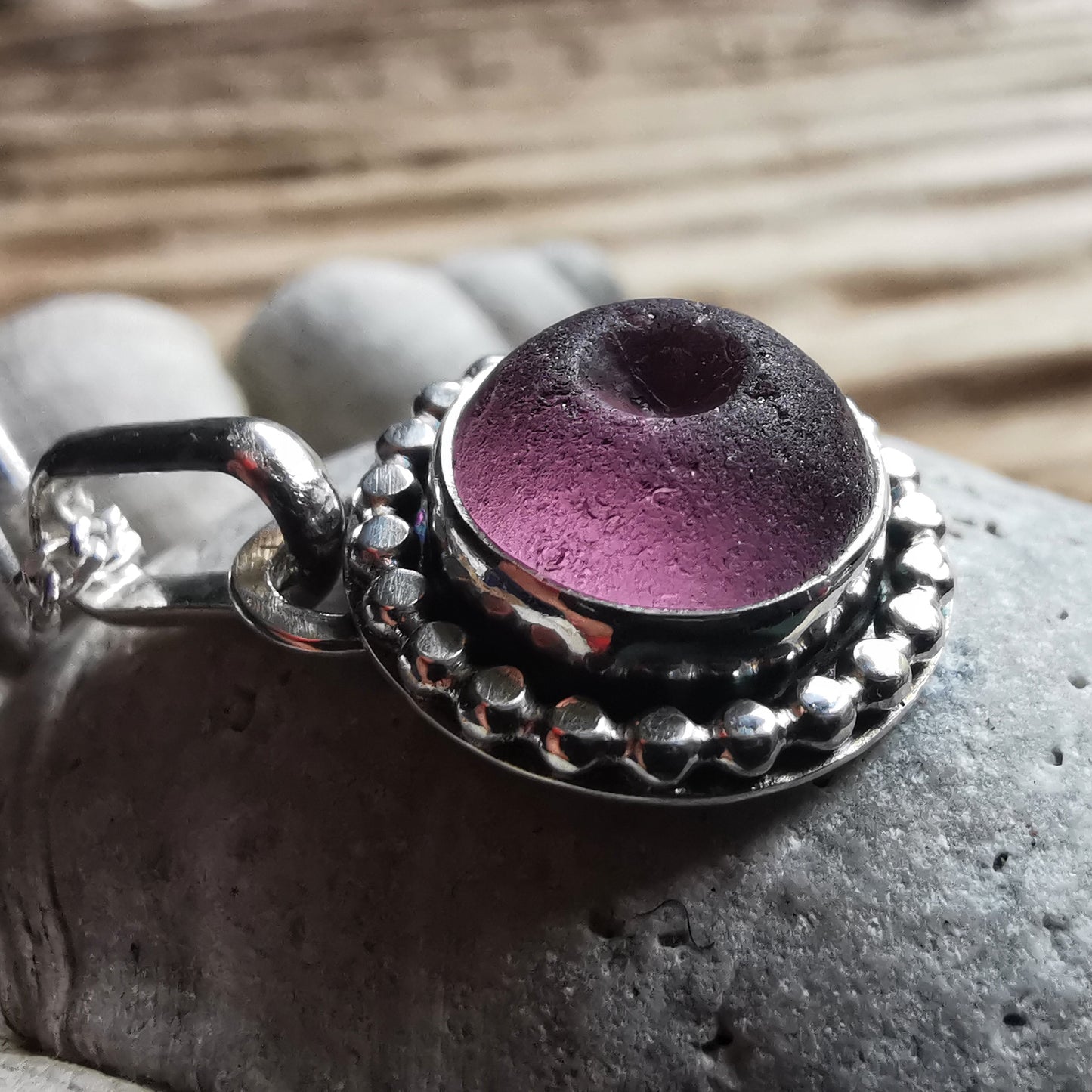 Tiny Scottish purple sea glass button & sterling silver pendant.