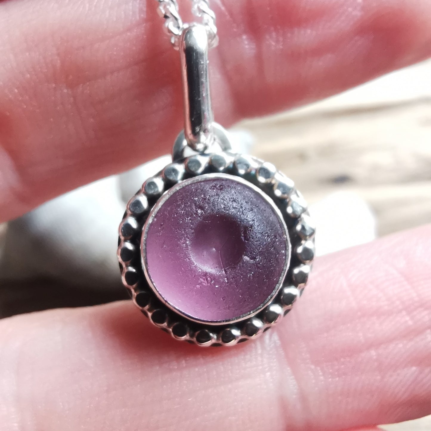 Tiny Scottish purple sea glass button & sterling silver pendant.