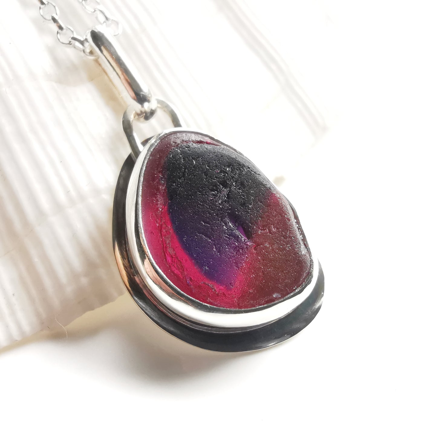 Pink and purple Seaham sea glass & sterling silver pendant.