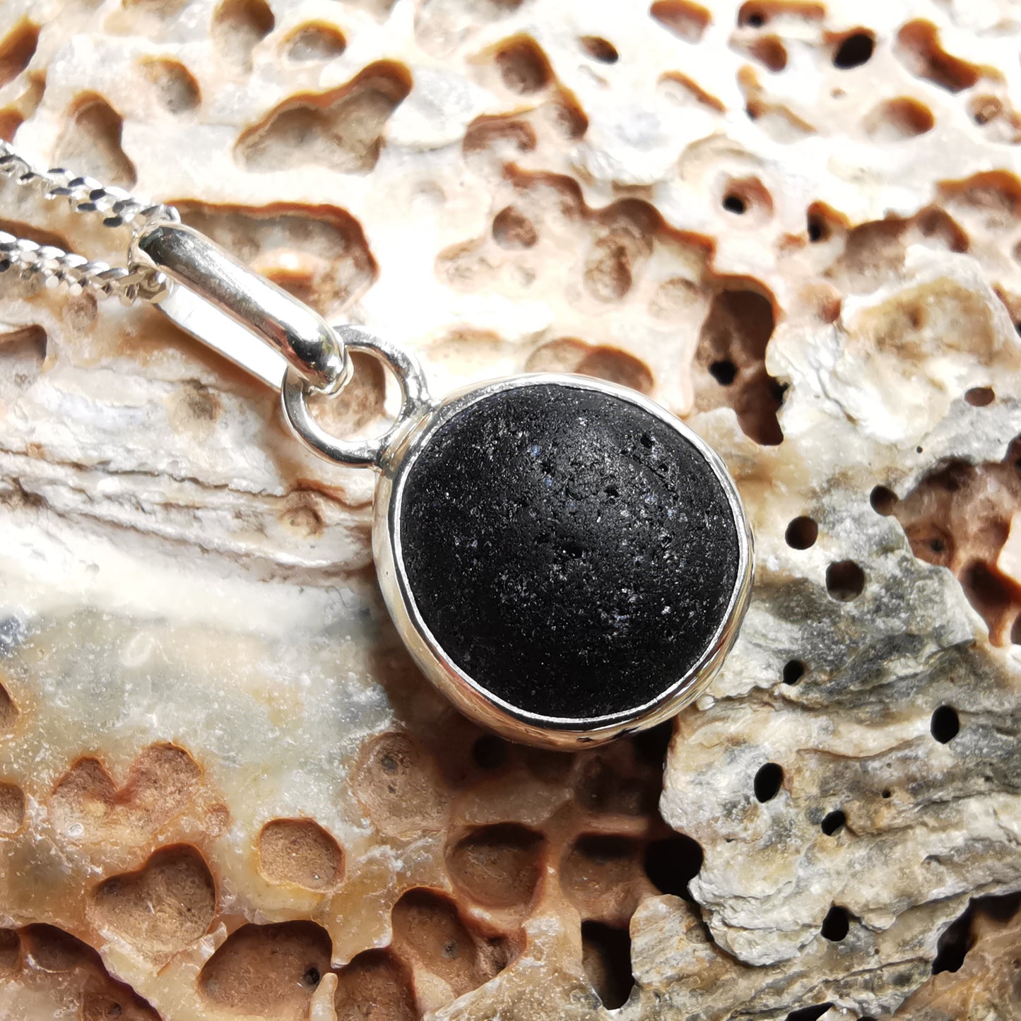 Seaham black sea glass & sterling silver pendant.