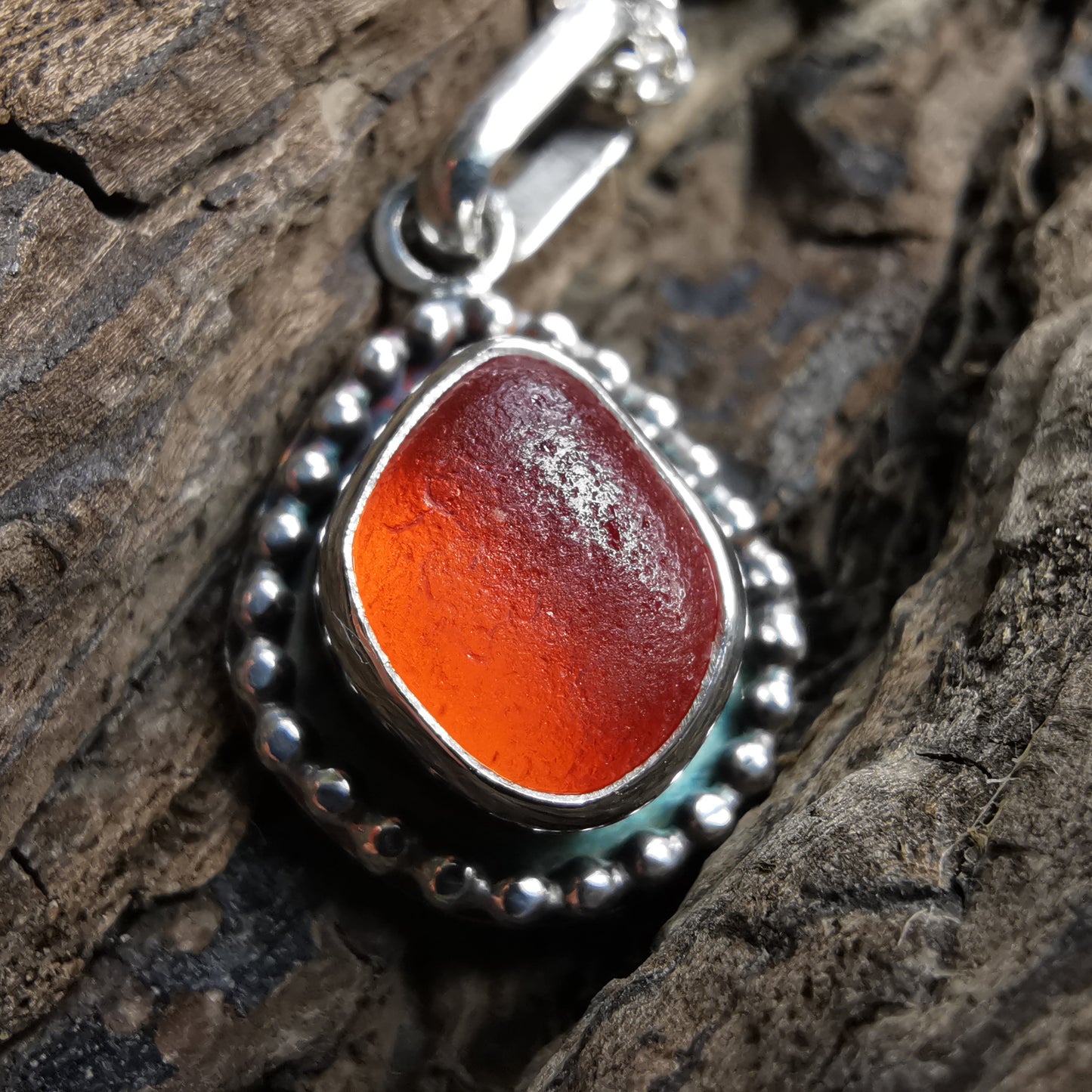 Seaham orange sea glass & sterling silver pendant.