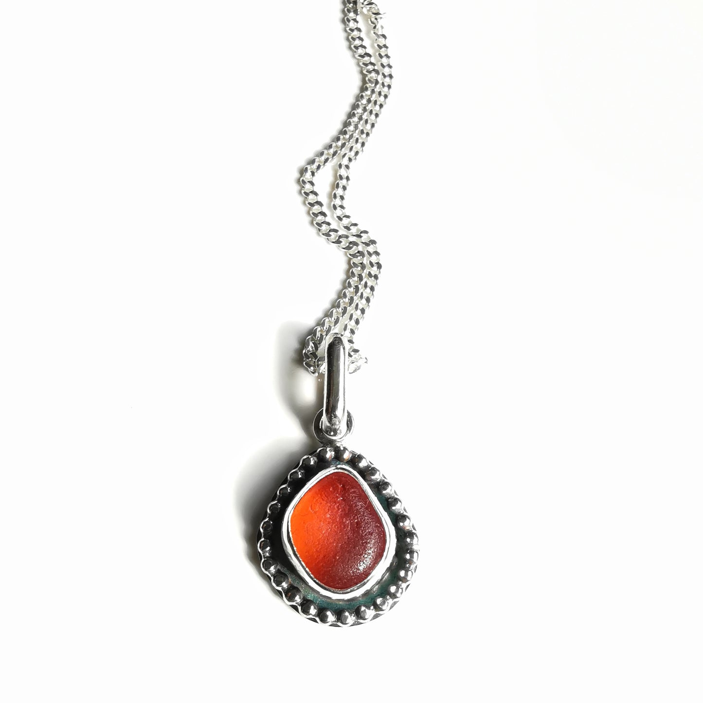 Seaham orange sea glass & sterling silver pendant.