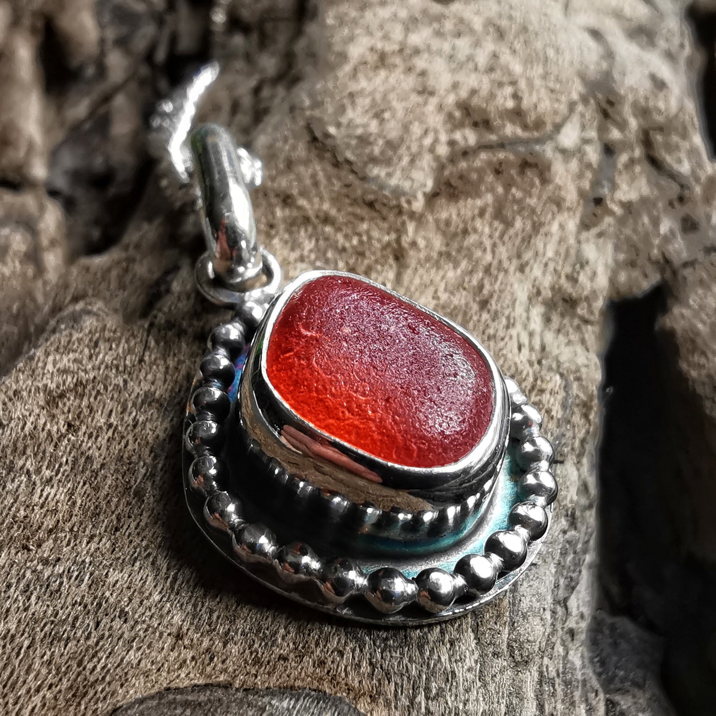 Seaham orange sea glass & sterling silver pendant.