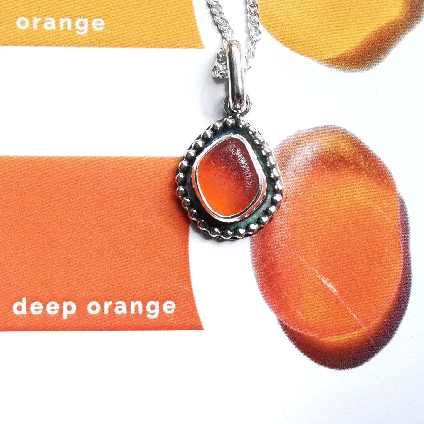 Seaham orange sea glass & sterling silver pendant.