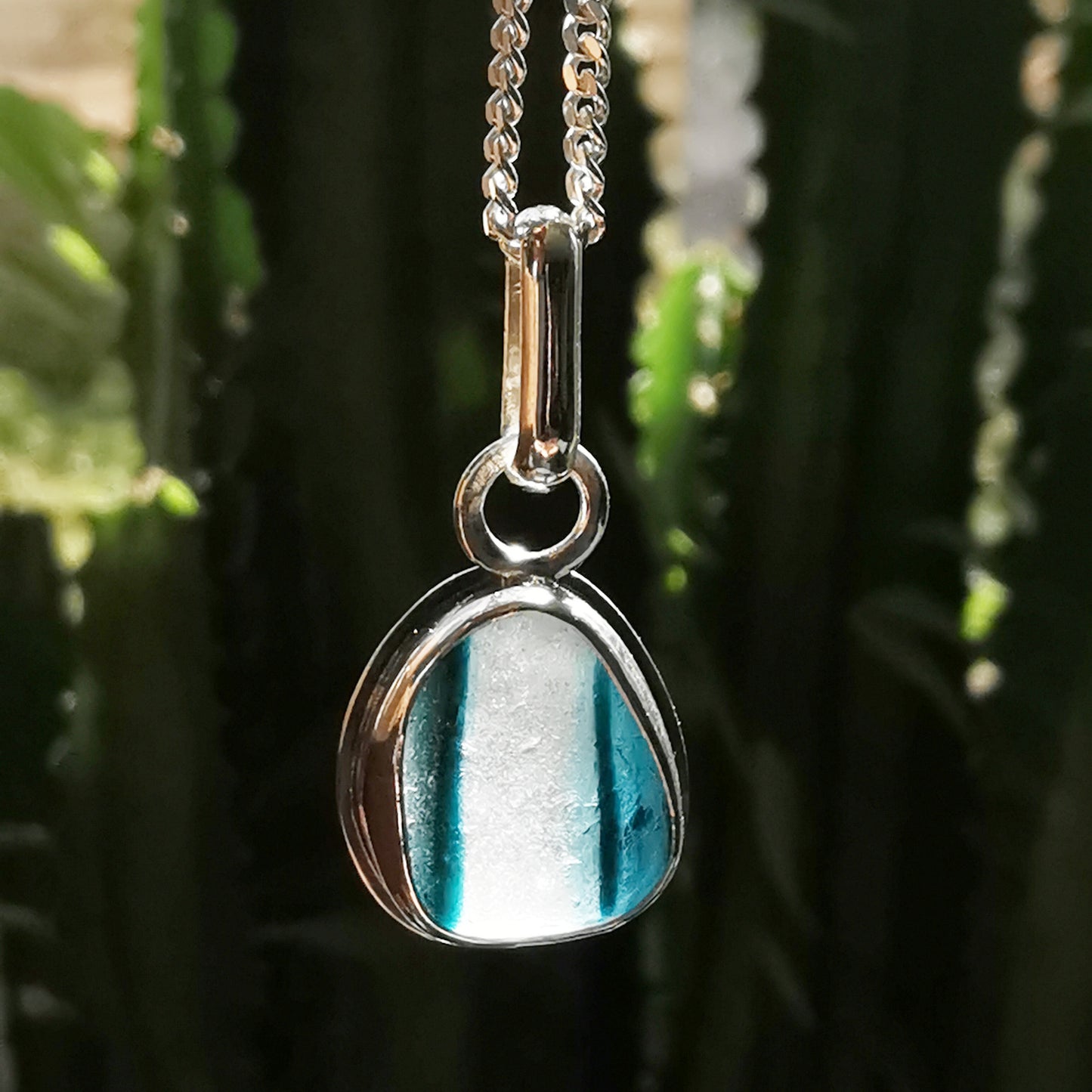 Seaham stripey teal, blue and clear multi sea glass & sterling silver pendant.