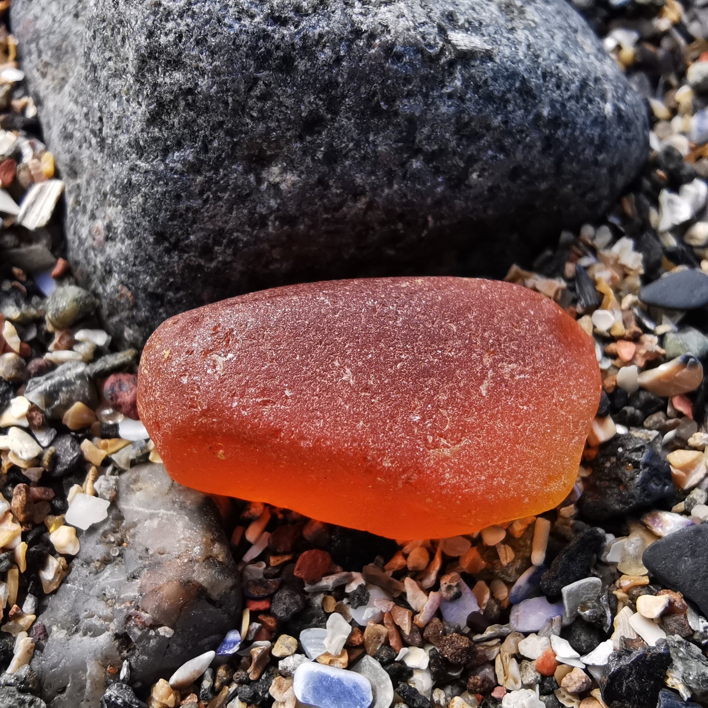 Scottish orange UV sea glass heart & sterling silver pendant.