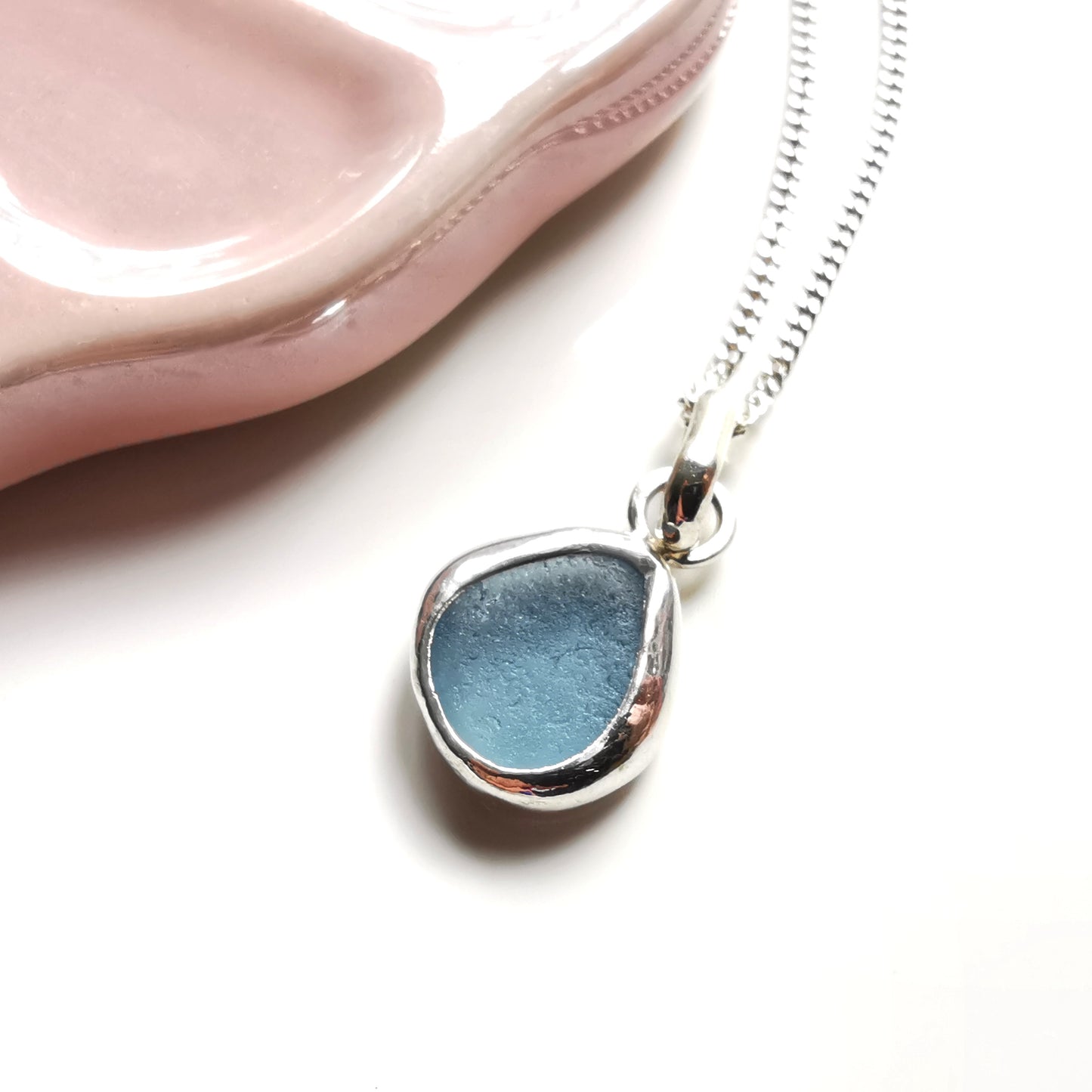 Seaham blue sea glass & sterling silver pendant.