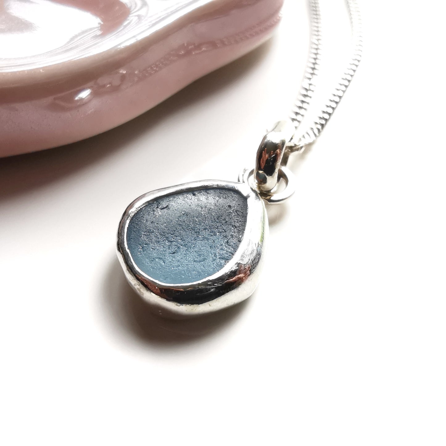 Seaham blue sea glass & sterling silver pendant.