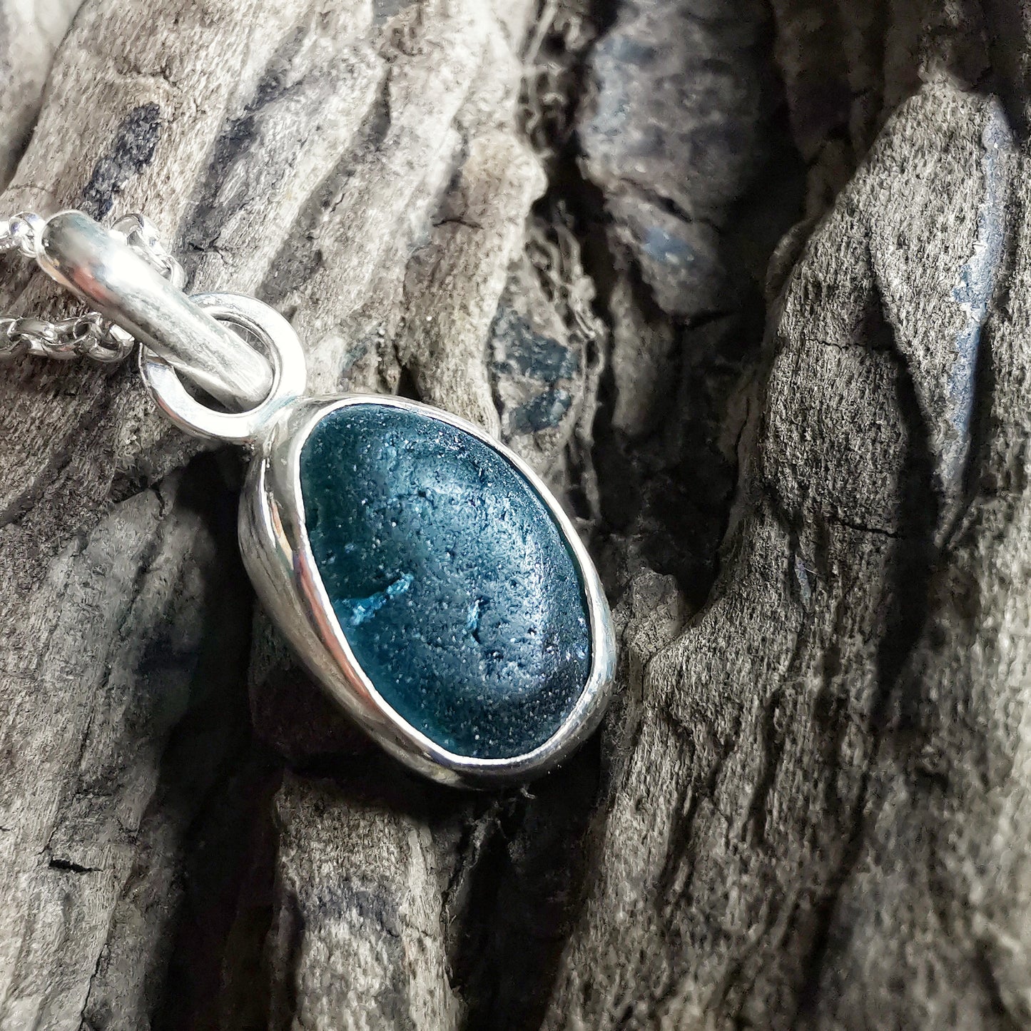 Scottish teal blue sea glass & sterling silver pendant.