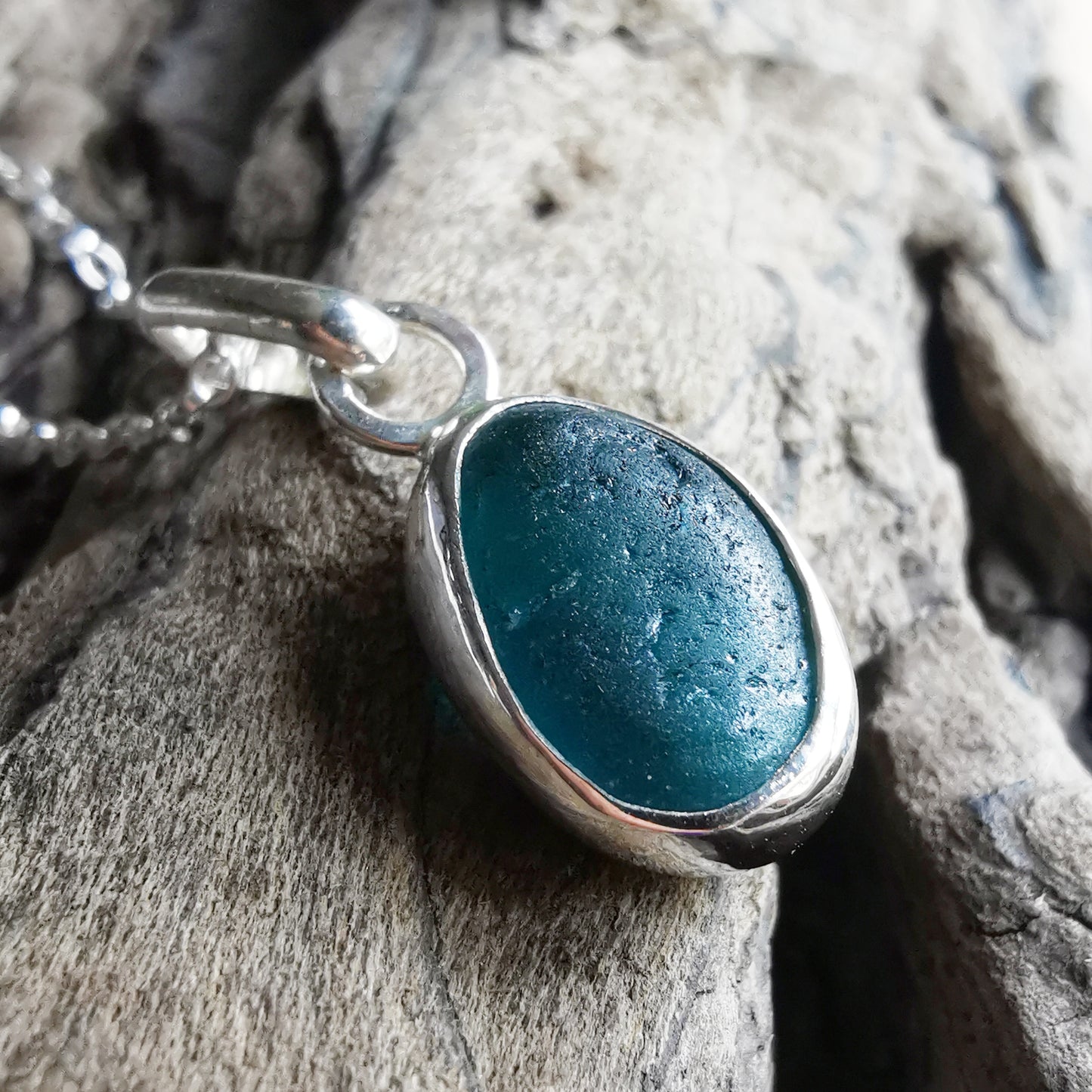 Scottish teal blue sea glass & sterling silver pendant.