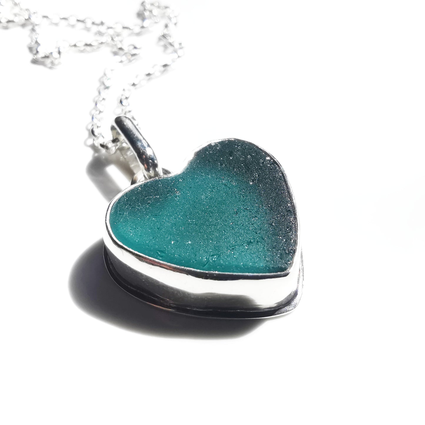 Reserved for Gatia. Scottish teal sea glass heart & sterling silver pendant.