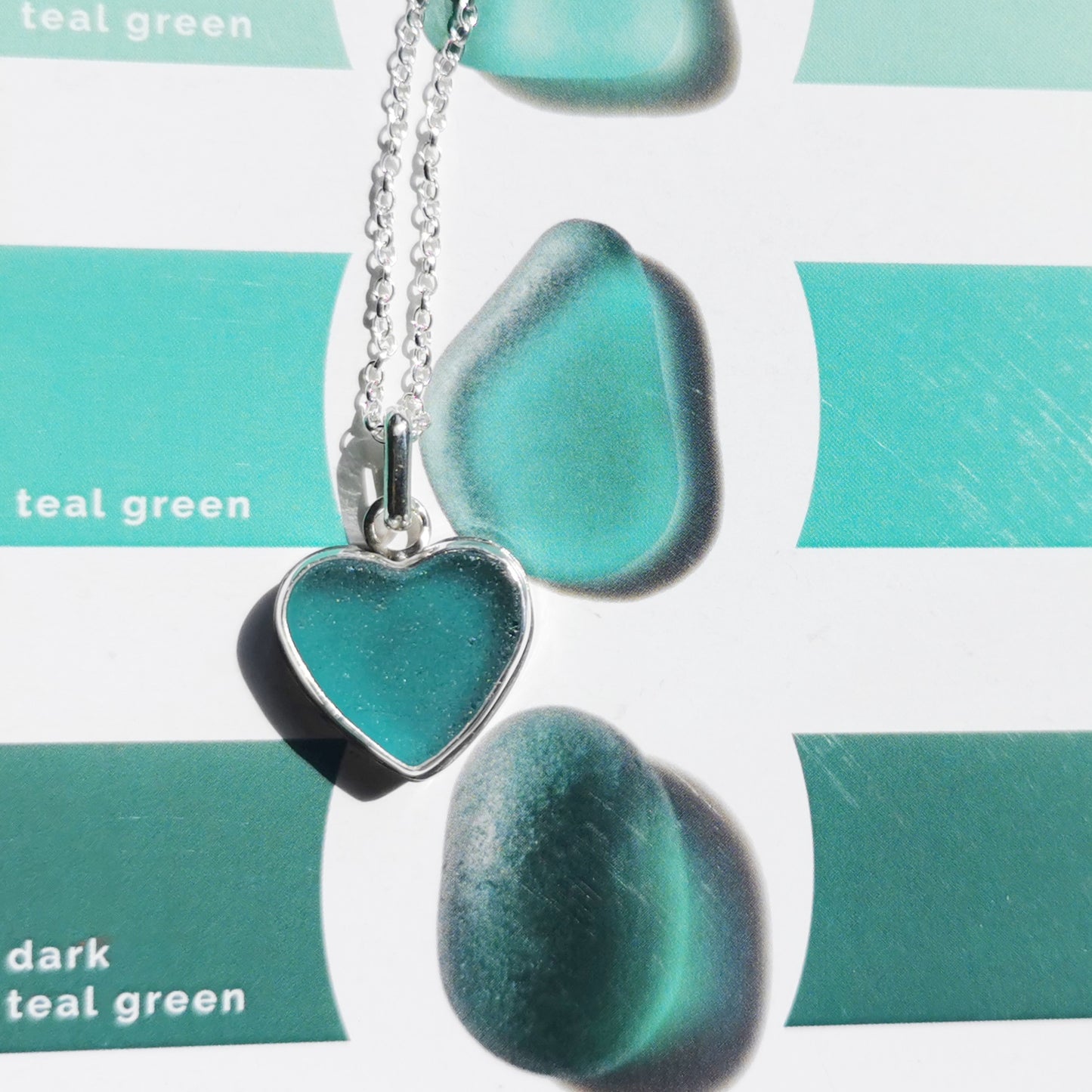 Reserved for Gatia. Scottish teal sea glass heart & sterling silver pendant.