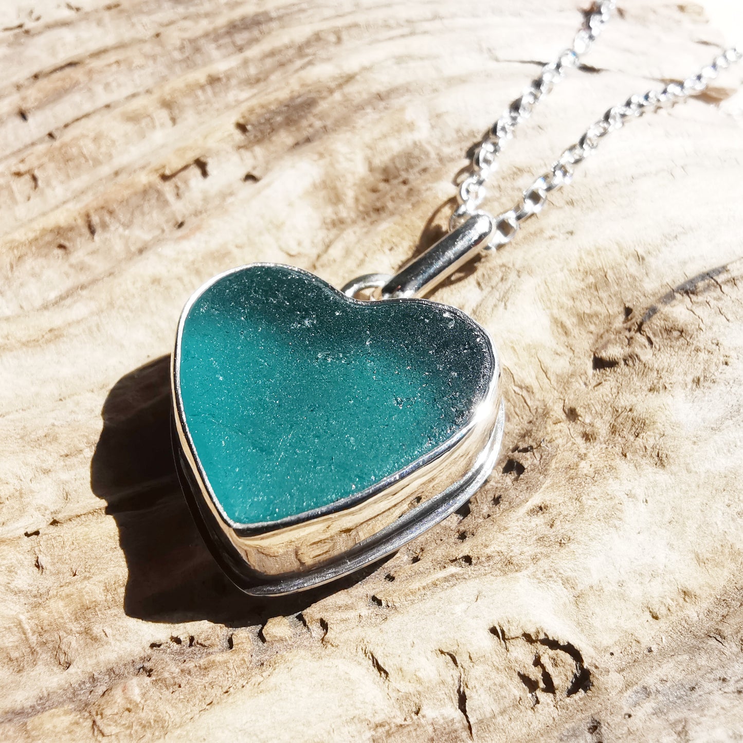 Reserved for Gatia. Scottish teal sea glass heart & sterling silver pendant.