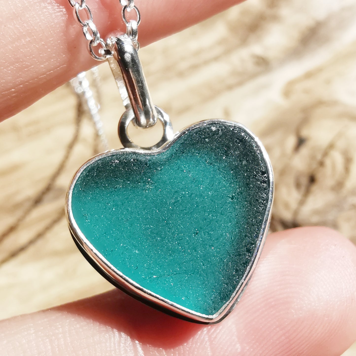 Reserved for Gatia. Scottish teal sea glass heart & sterling silver pendant.