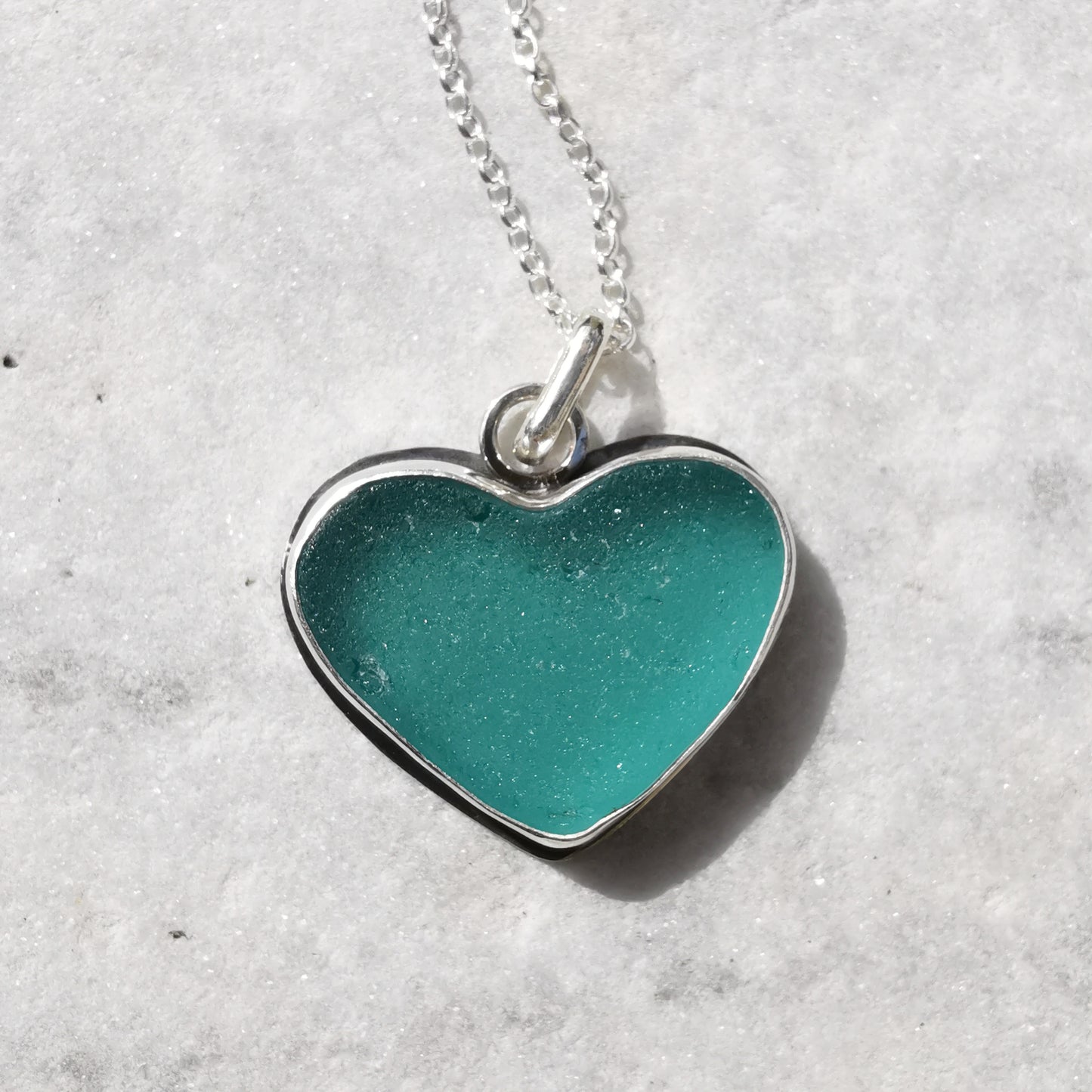 Reserved for Gatia. Scottish teal sea glass heart & sterling silver pendant.