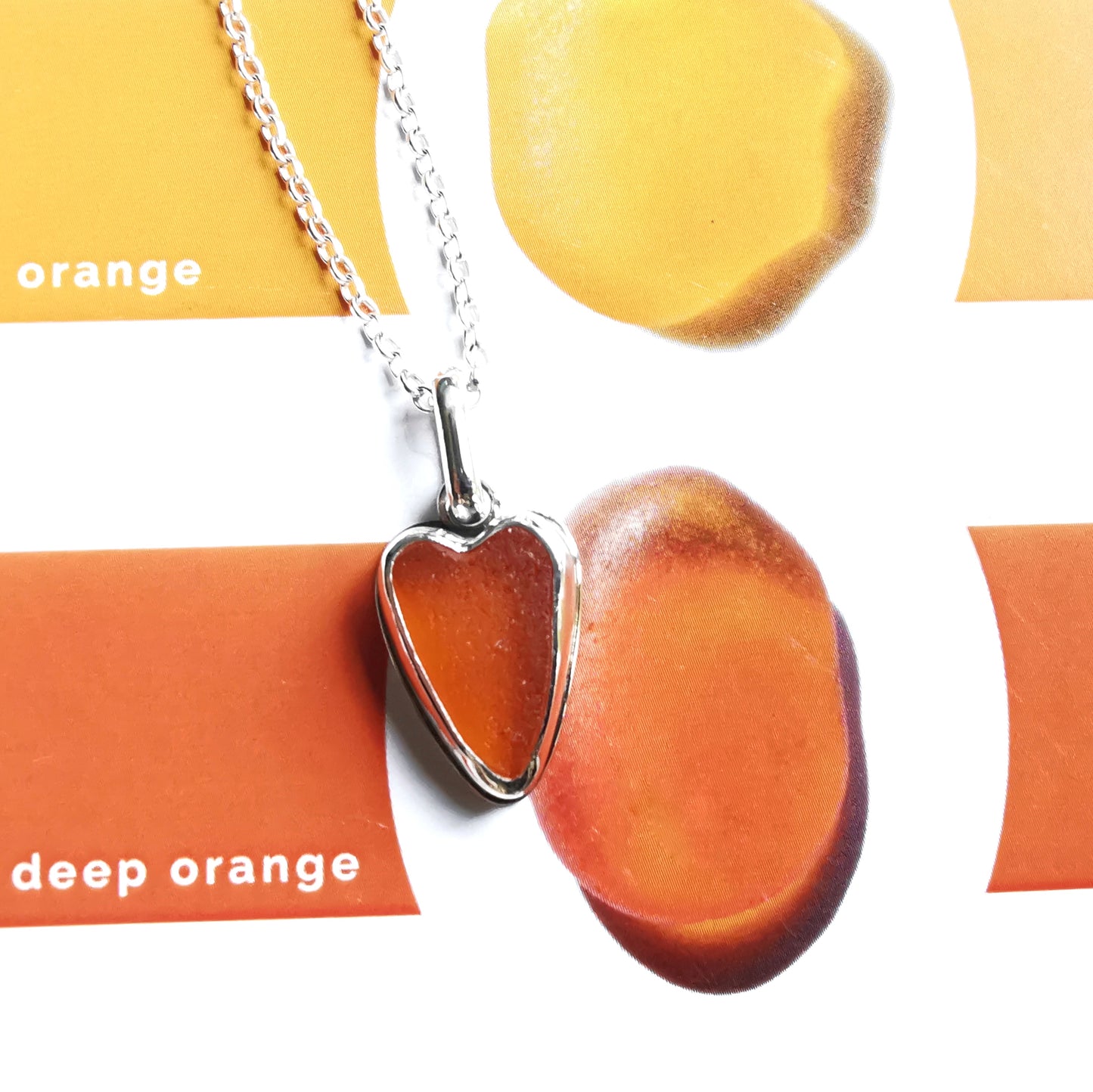 Scottish orange UV sea glass heart & sterling silver pendant.