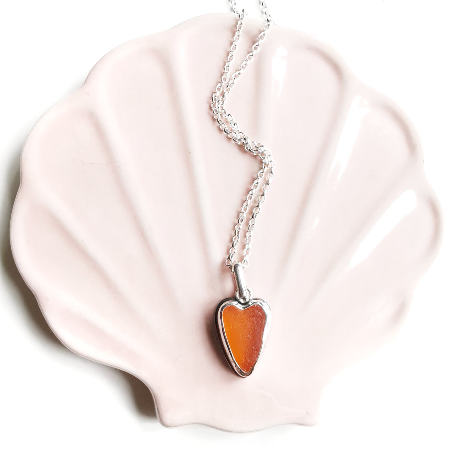 Scottish orange UV sea glass heart & sterling silver pendant.