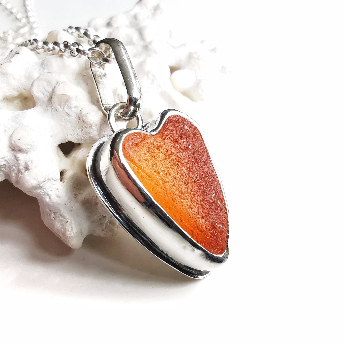 Scottish orange UV sea glass heart & sterling silver pendant.