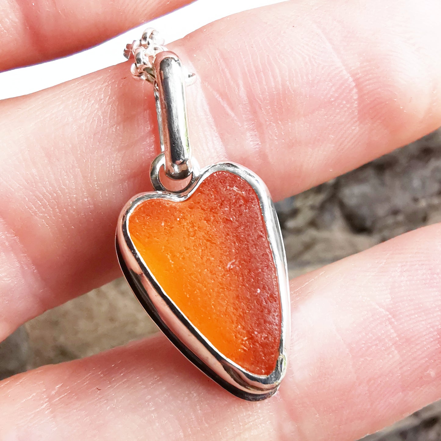 Scottish orange UV sea glass heart & sterling silver pendant.