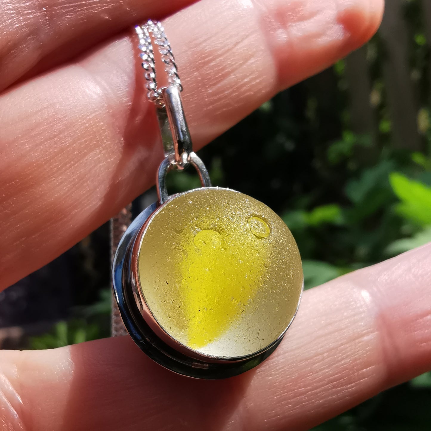 Scottish partial yellow sea glass marble & sterling silver pendant.