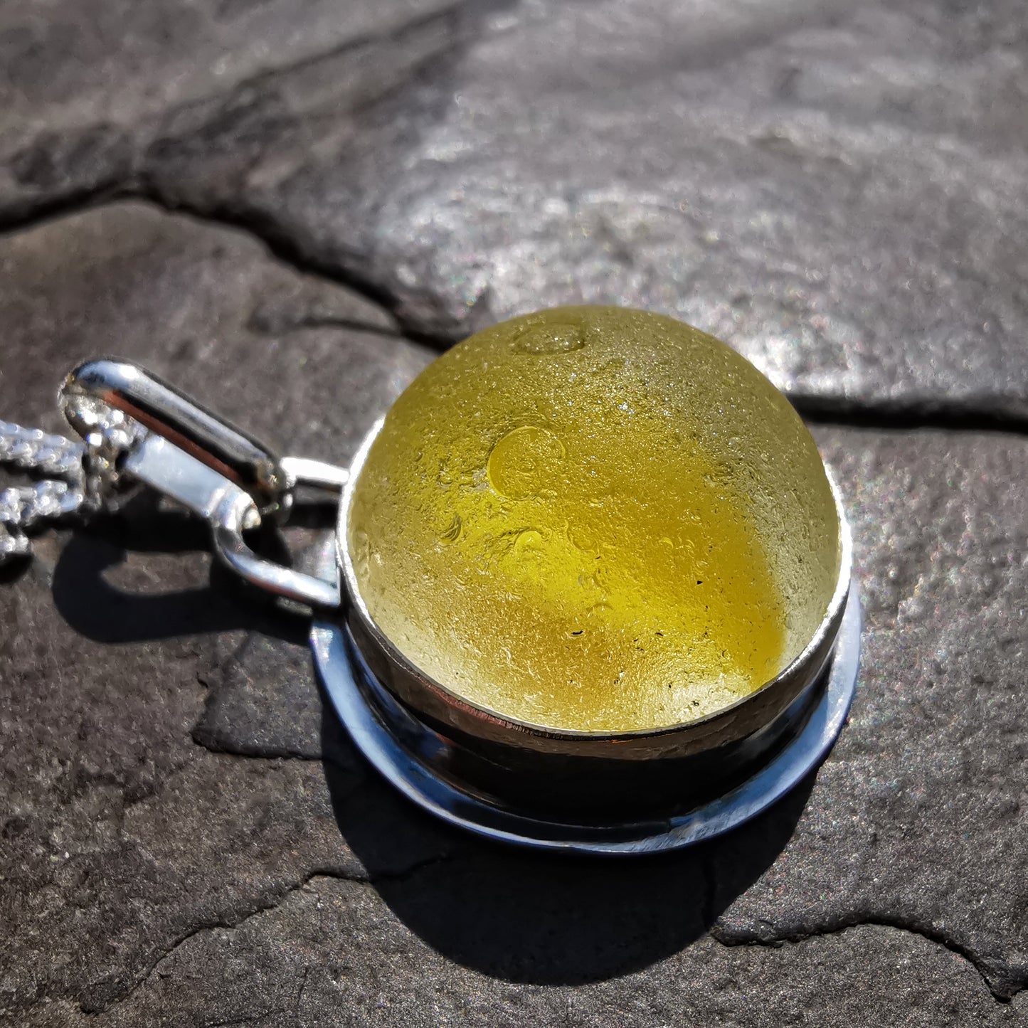 Scottish partial yellow sea glass marble & sterling silver pendant.