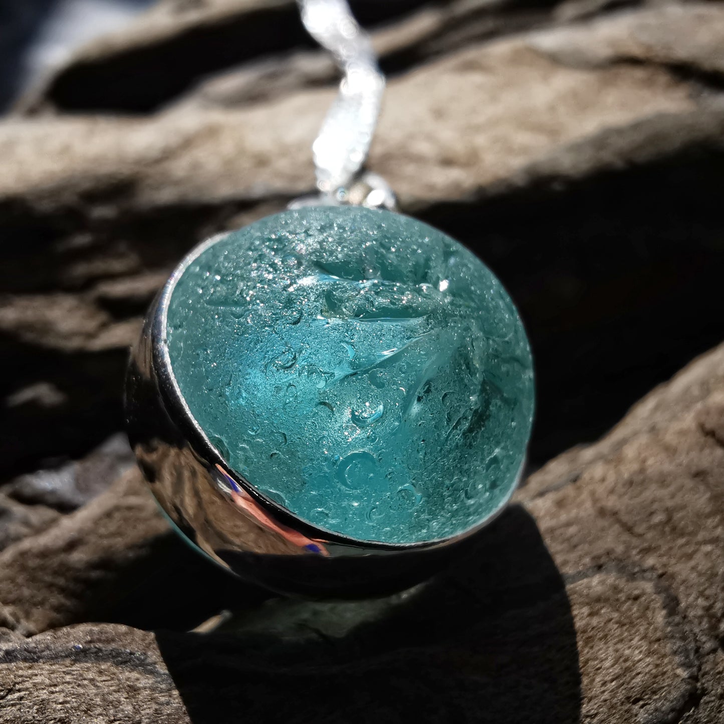 Scottish light aqua blue sea glass marble & sterling silver pendant.