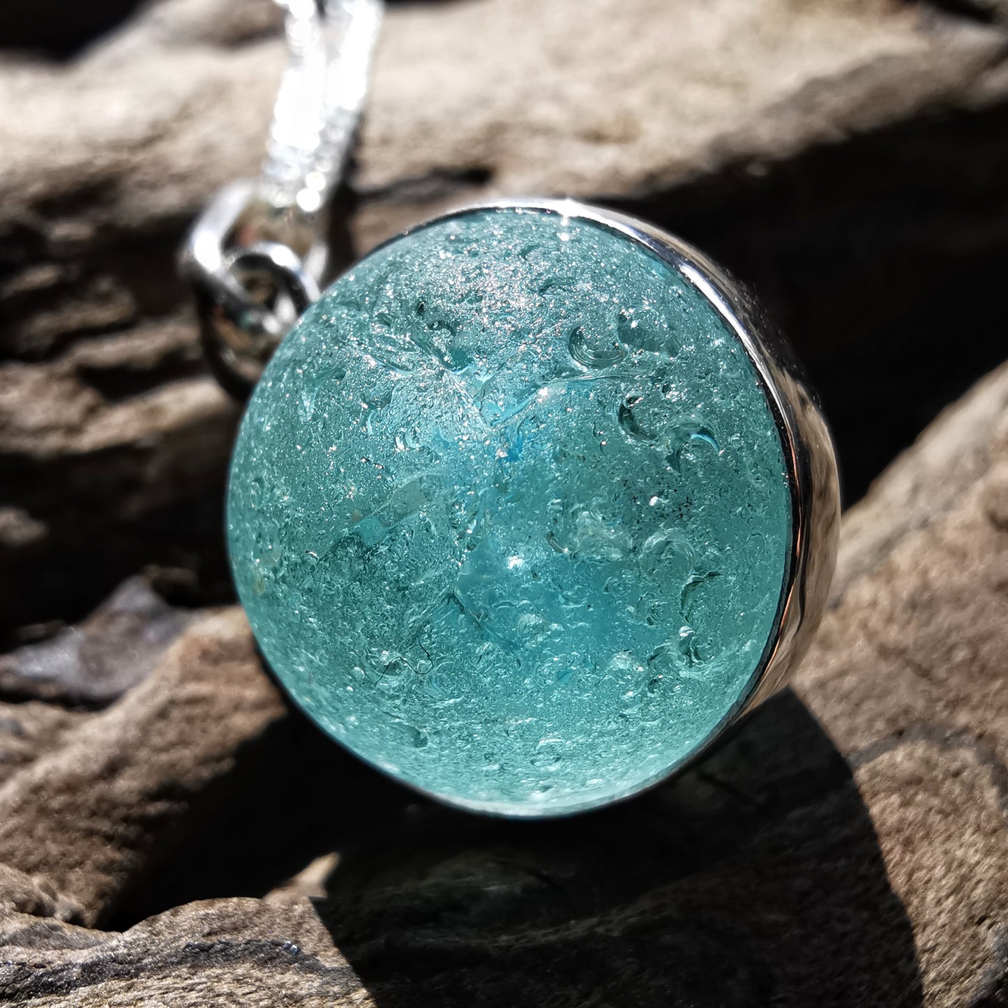 Scottish light aqua blue sea glass marble & sterling silver pendant.