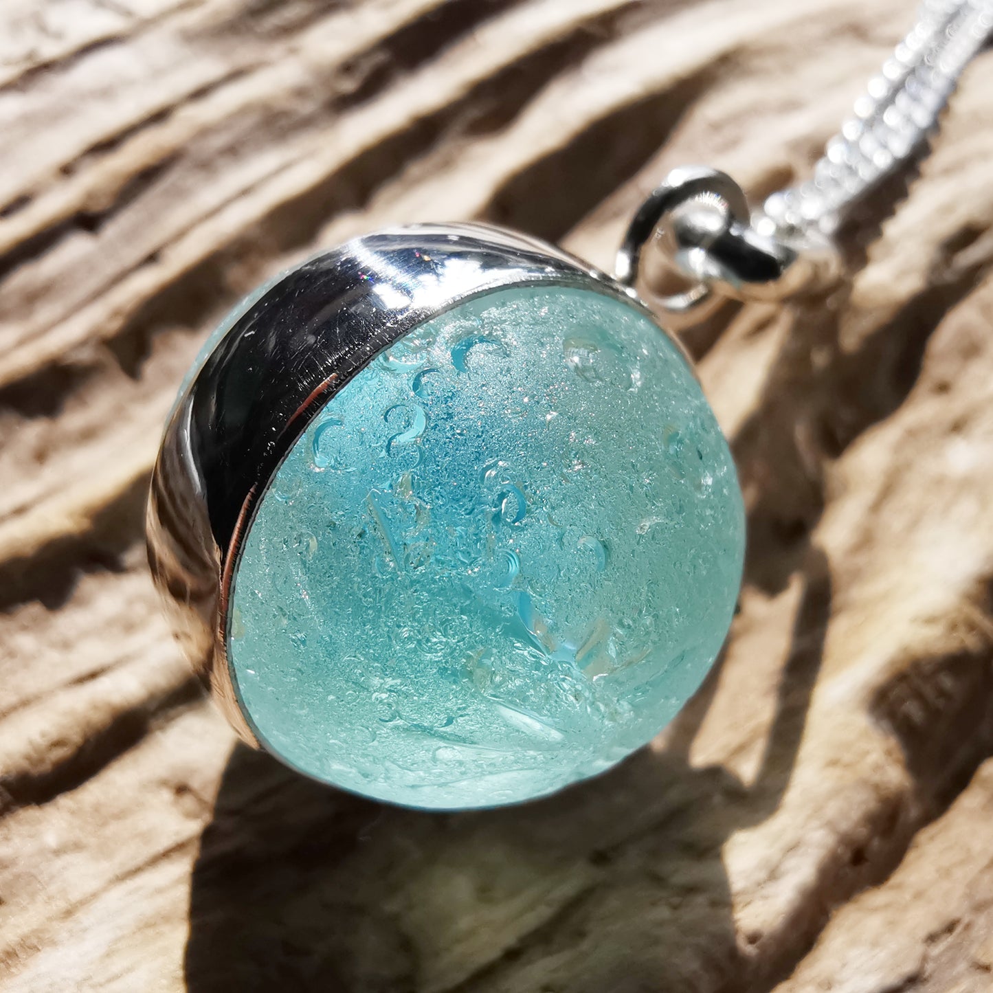 Scottish light aqua blue sea glass marble & sterling silver pendant.