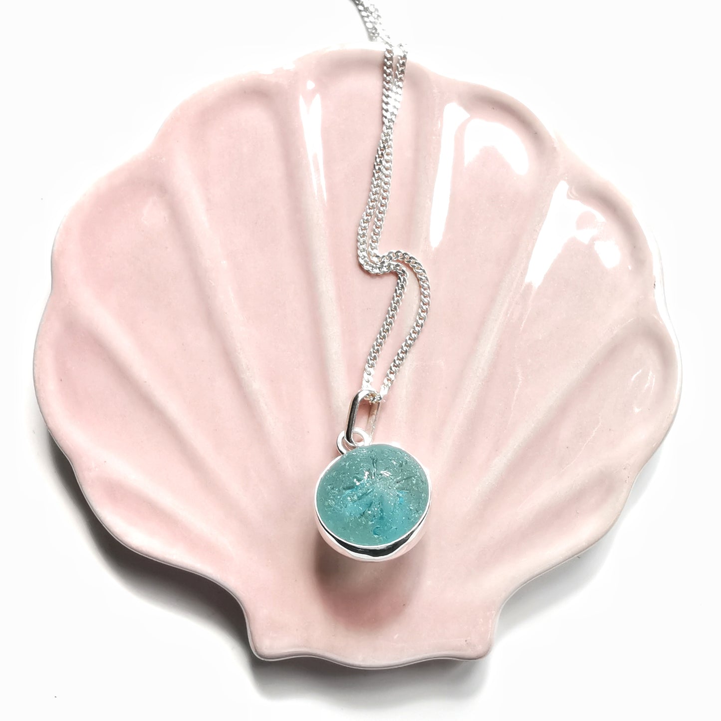 Scottish light aqua blue sea glass marble & sterling silver pendant.