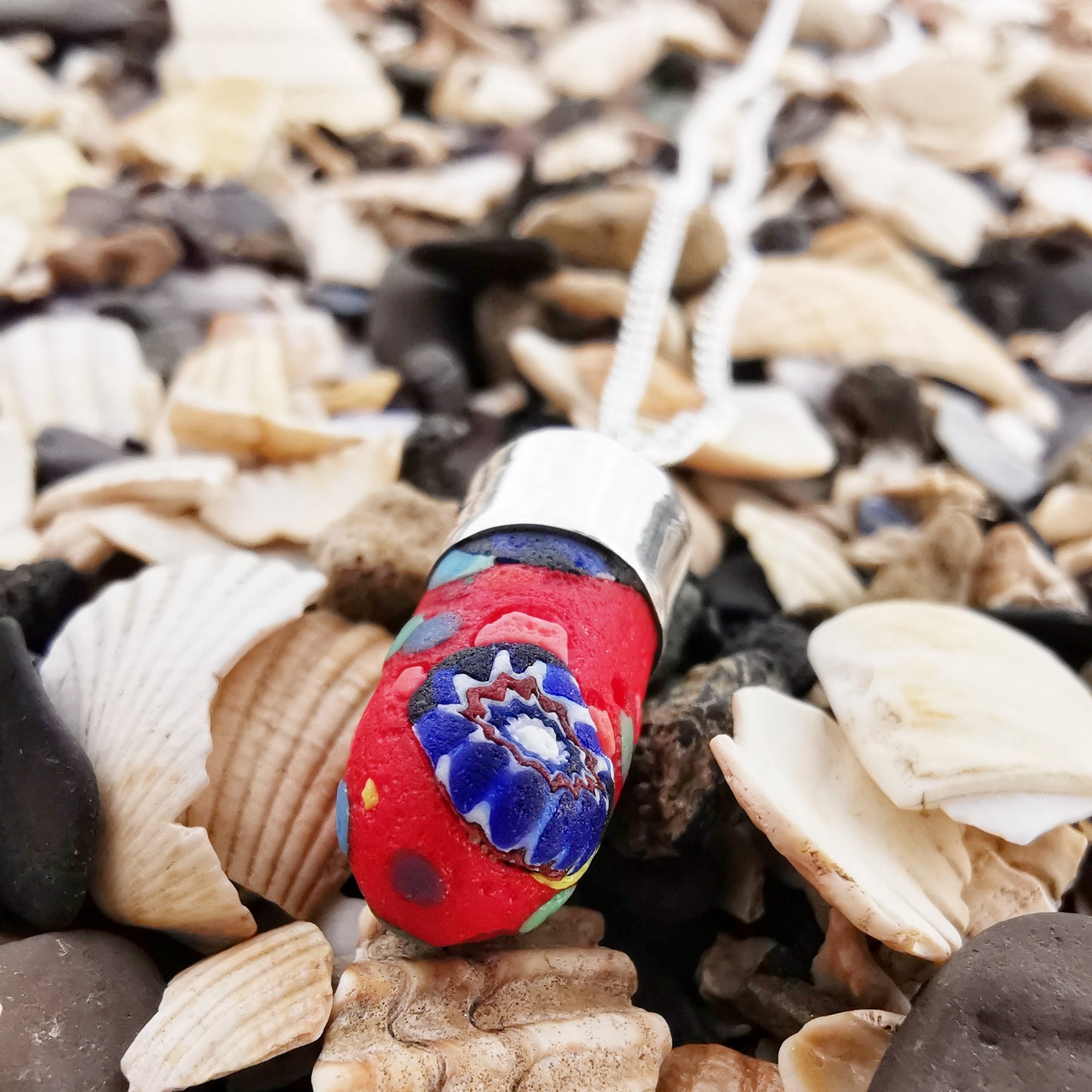 Millefiori sea glass hat pin & sterling silver pendant.