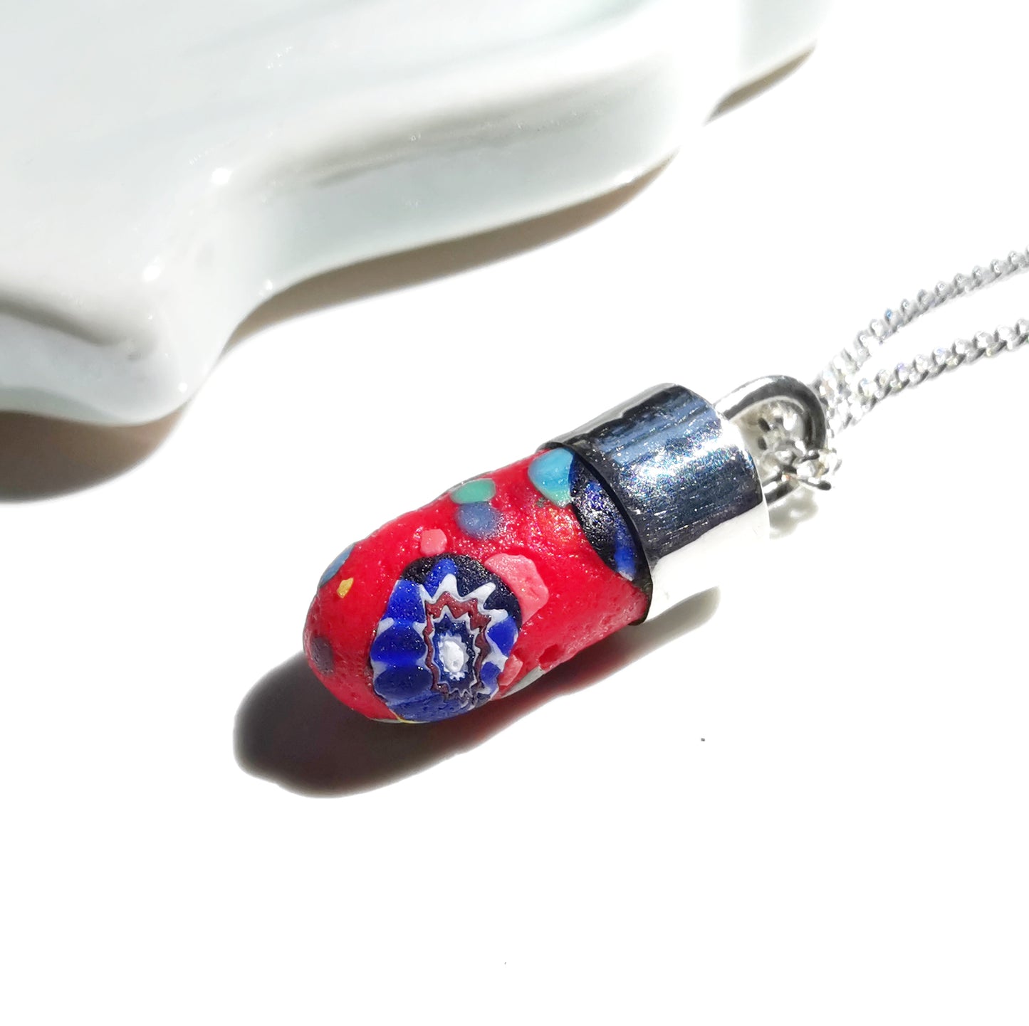 Millefiori sea glass hat pin & sterling silver pendant.