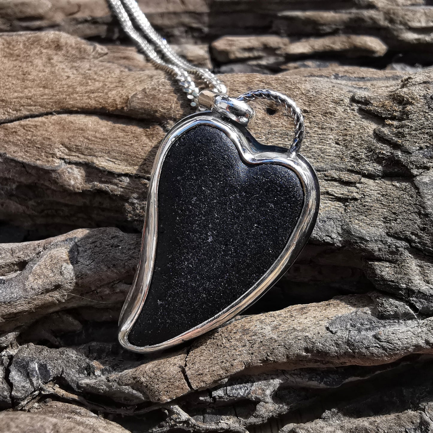 Scottish black sea glass heart & sterling silver pendant.