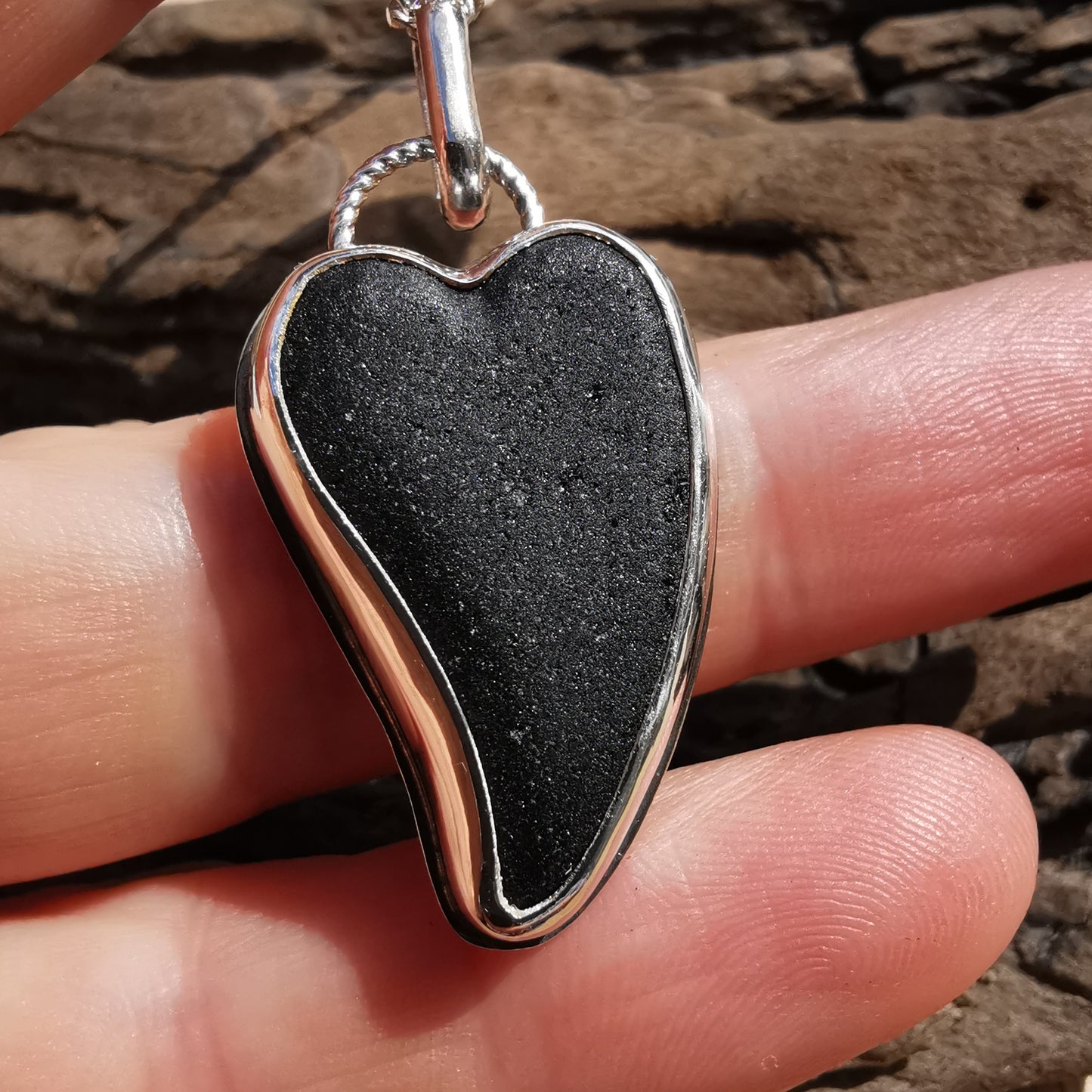 Scottish black sea glass heart & sterling silver pendant.