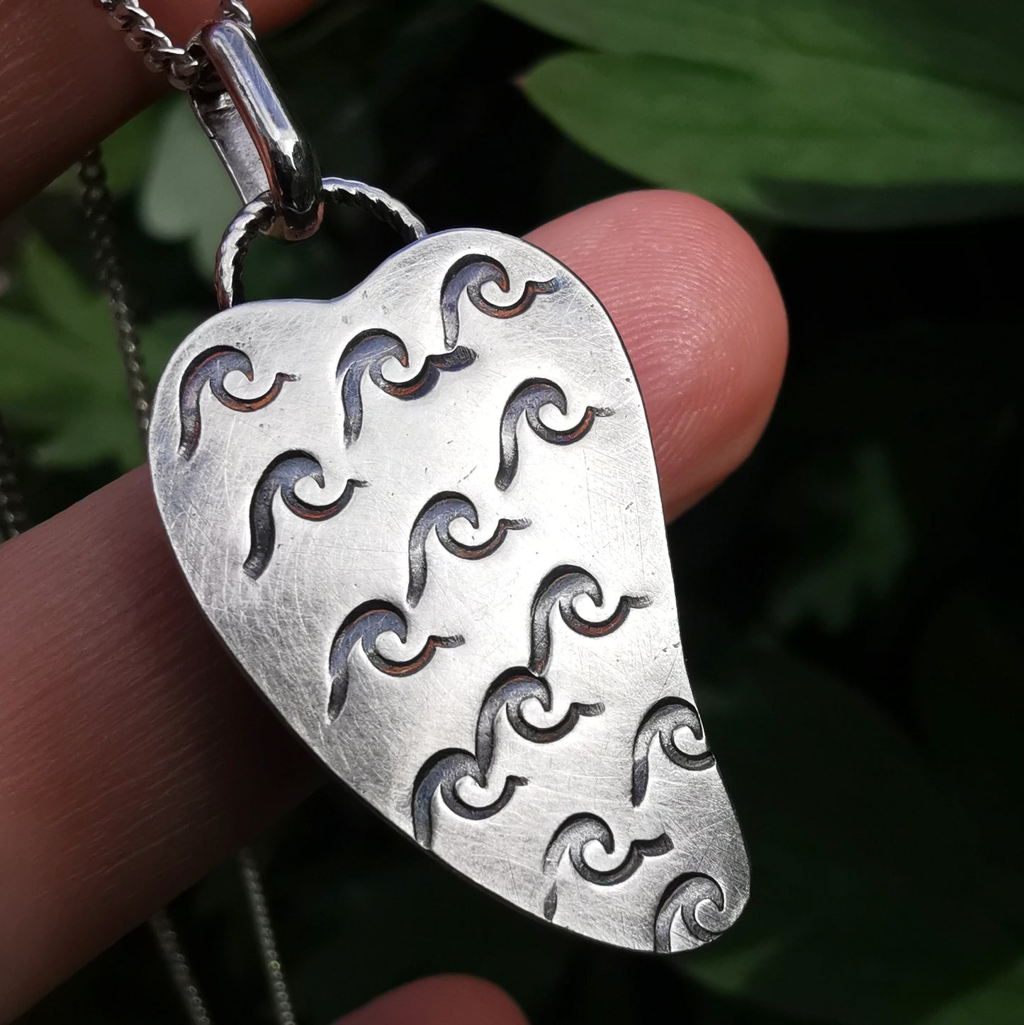 Scottish black sea glass heart & sterling silver pendant.