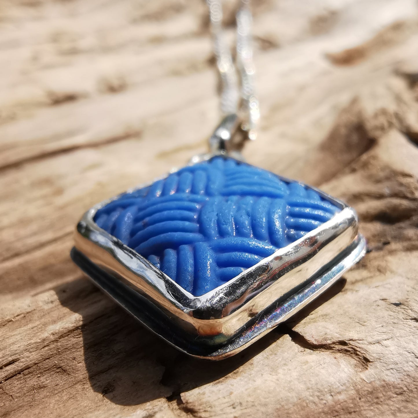 Scottish blue sea glass button & sterling silver pendant.