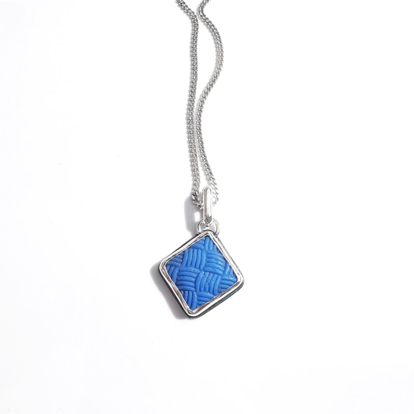 Scottish blue sea glass button & sterling silver pendant.