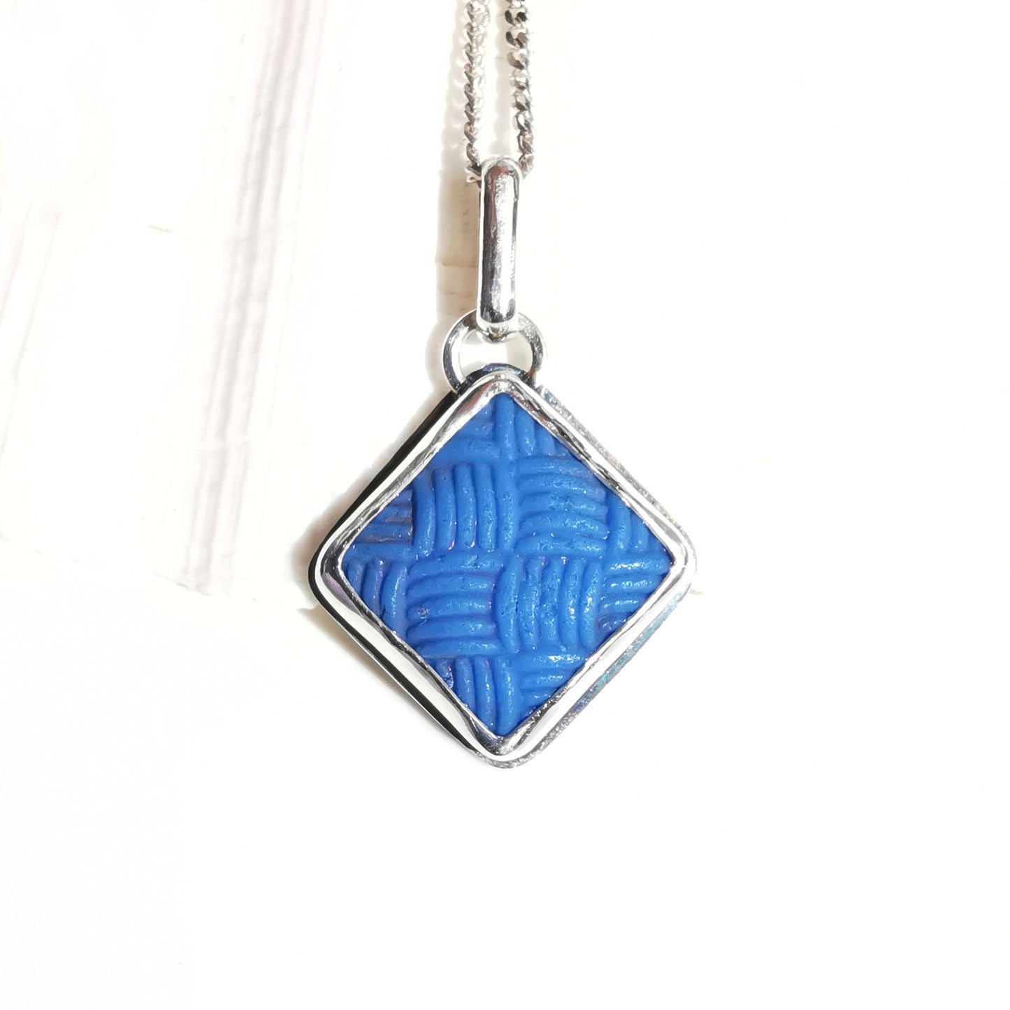 Scottish blue sea glass button & sterling silver pendant.