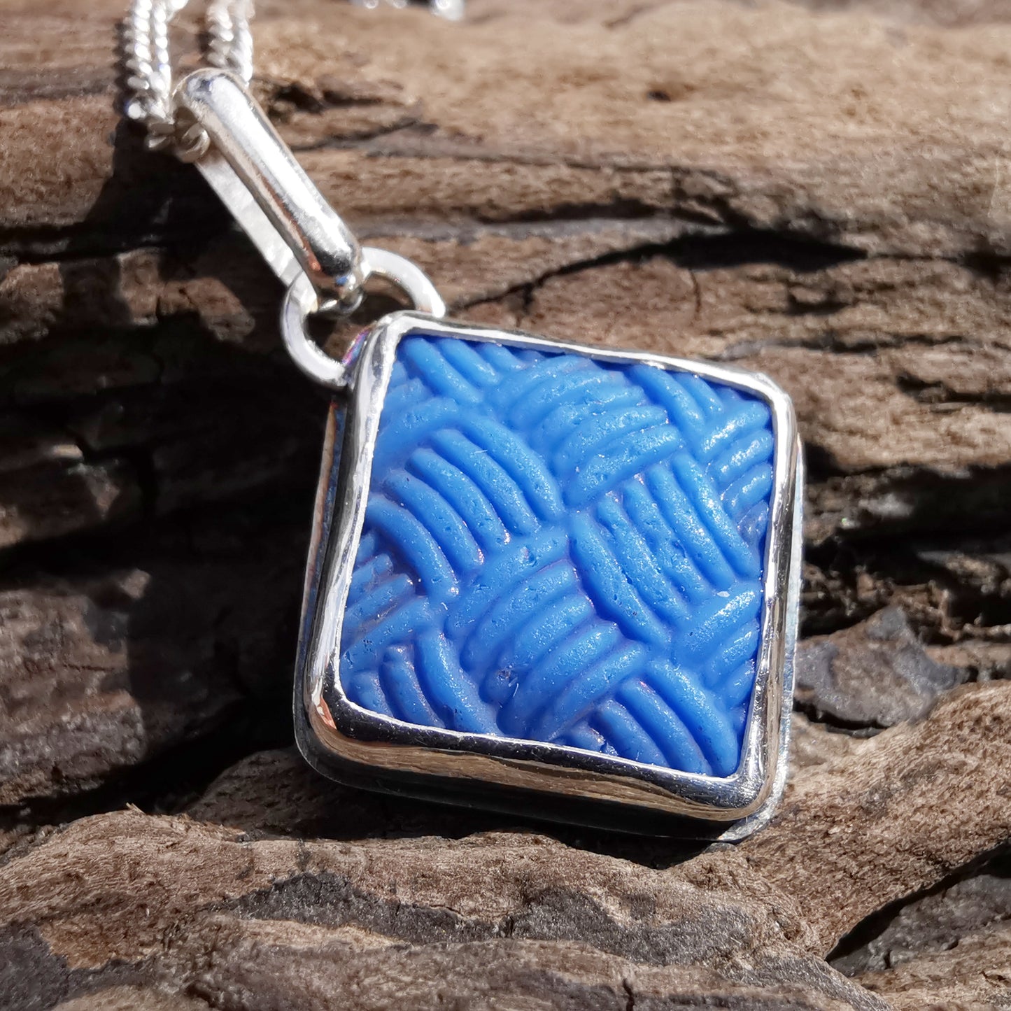 Scottish blue sea glass button & sterling silver pendant.