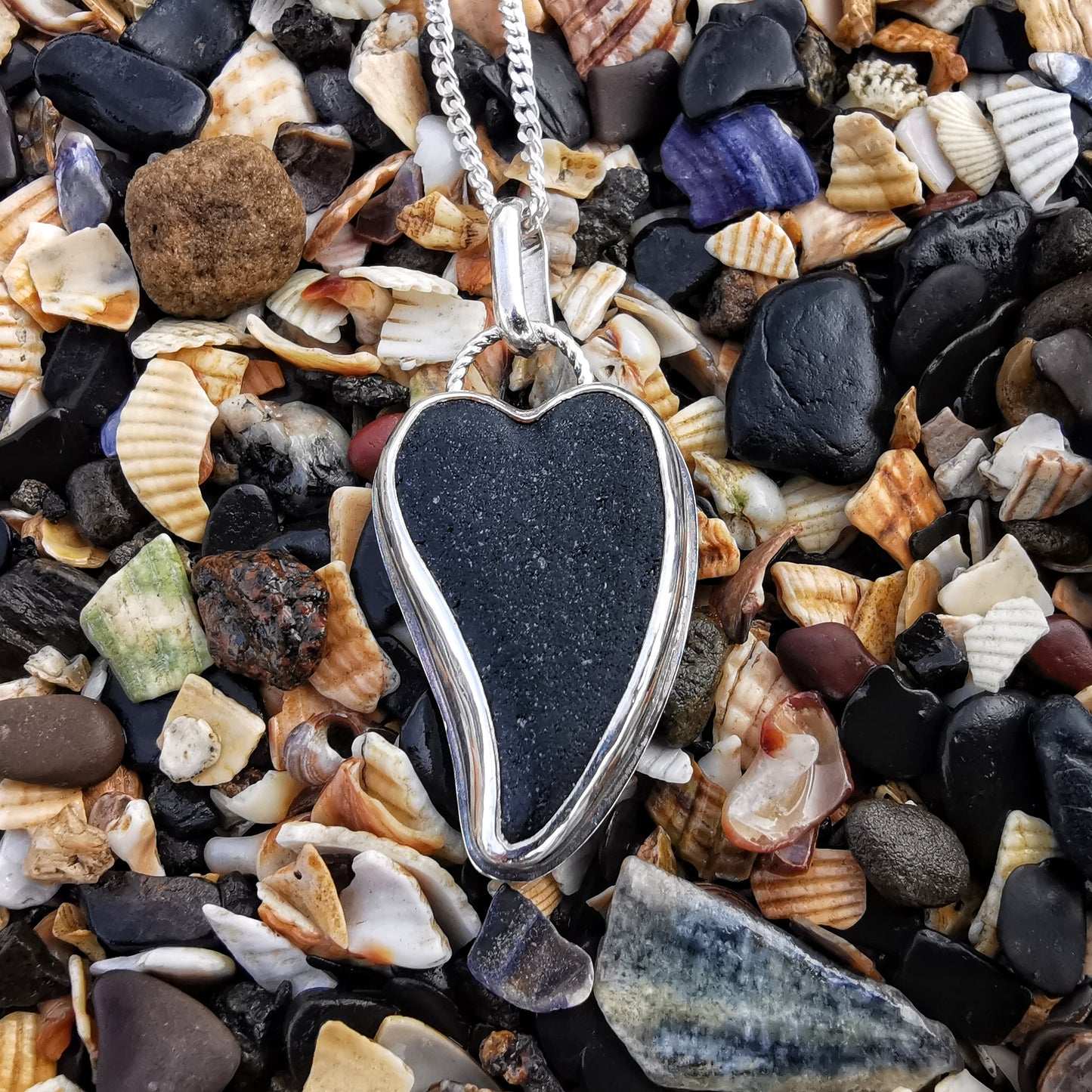 Scottish black sea glass heart & sterling silver pendant.