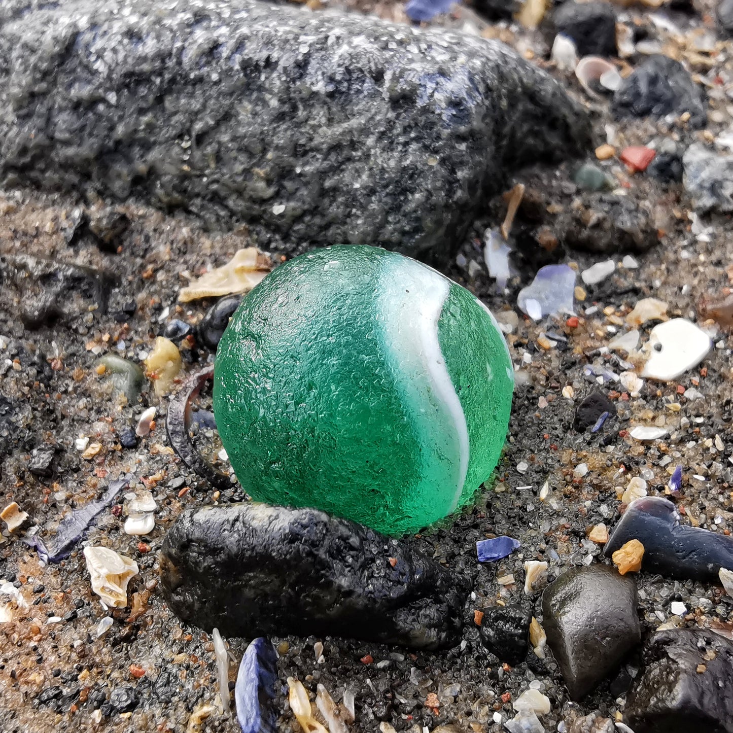 Scottish teal green sea glass marble & sterling silver pendant.