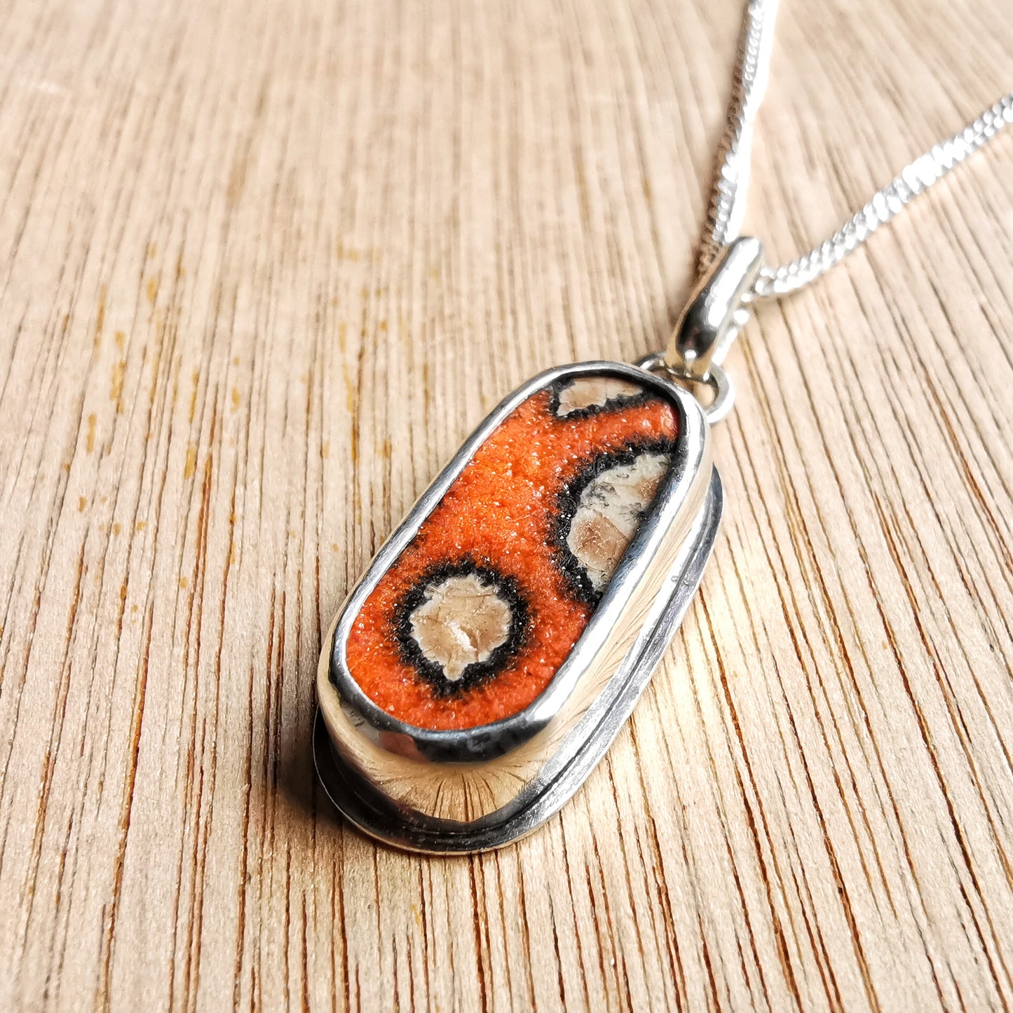 Scottish orange 'vitamin sea' sea pottery & sterling silver pendant.