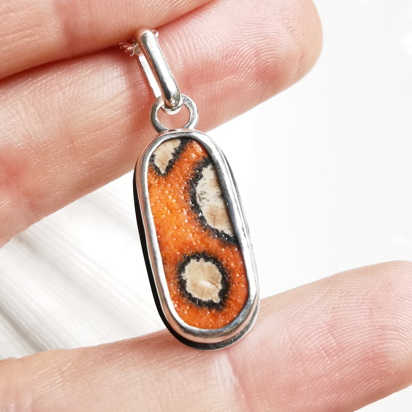 Scottish orange 'vitamin sea' sea pottery & sterling silver pendant.