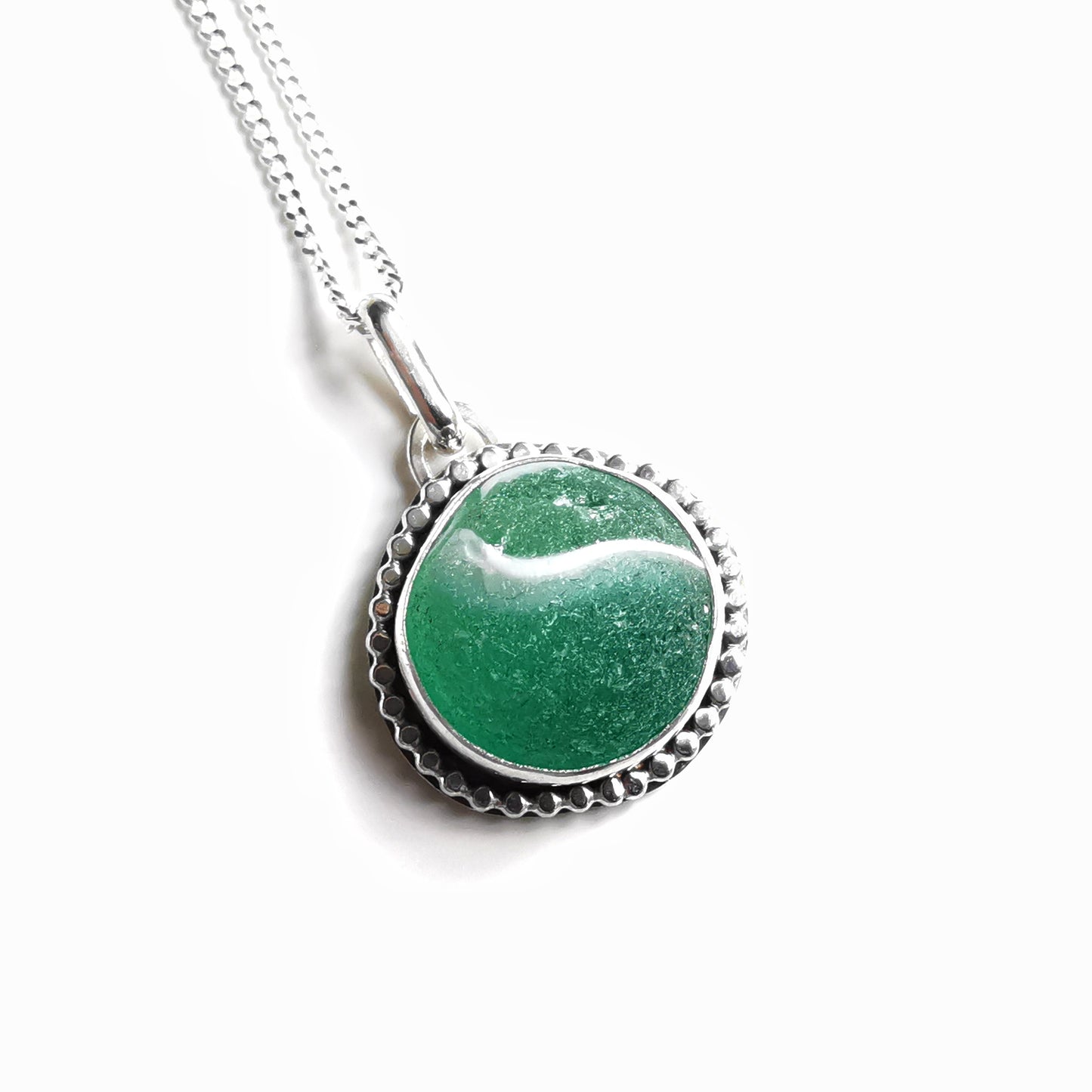 Scottish teal green sea glass marble & sterling silver pendant.