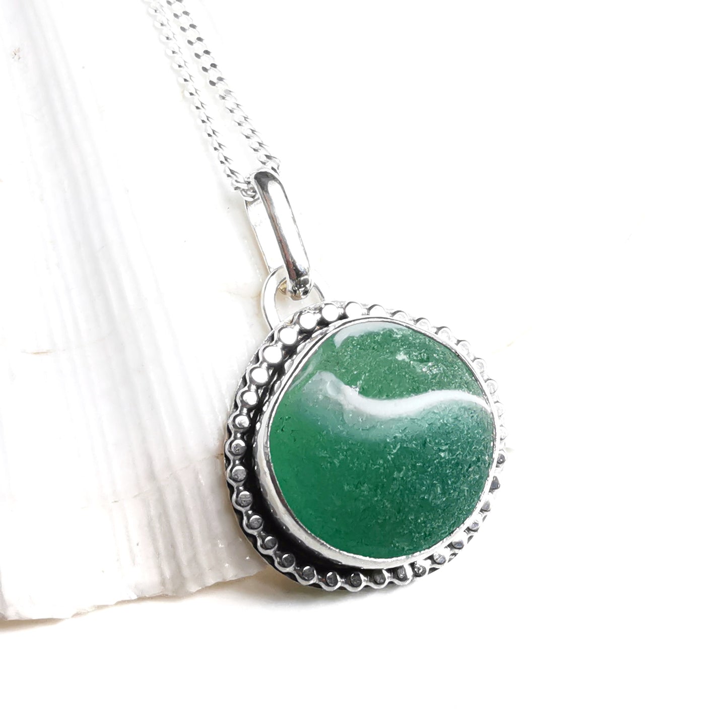 Scottish teal green sea glass marble & sterling silver pendant.