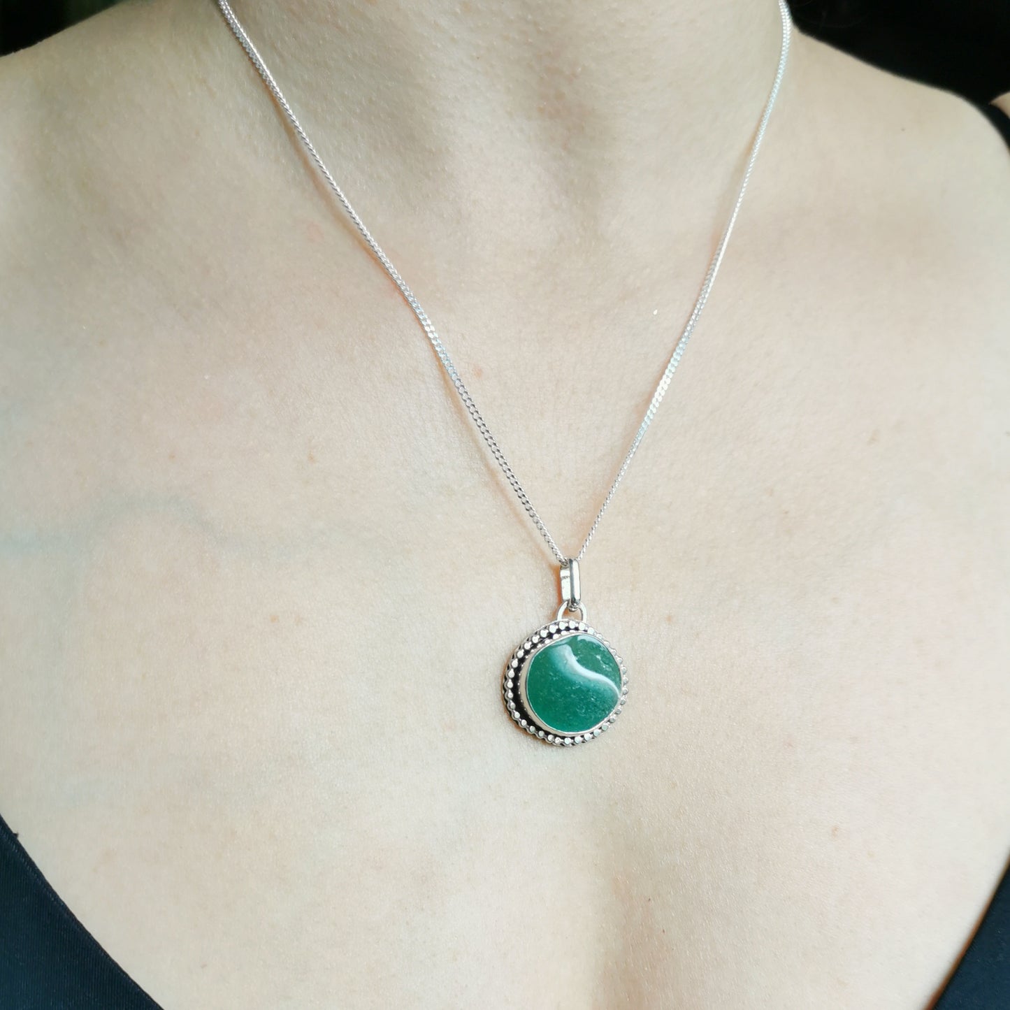 Scottish teal green sea glass marble & sterling silver pendant.