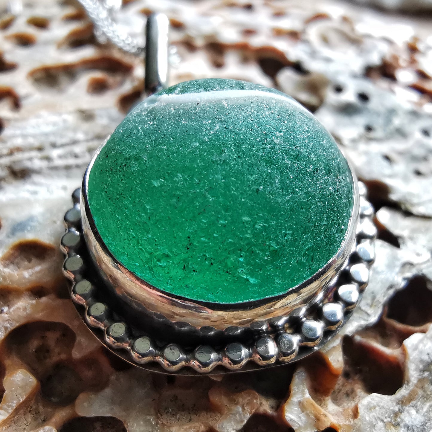 Scottish teal green sea glass marble & sterling silver pendant.