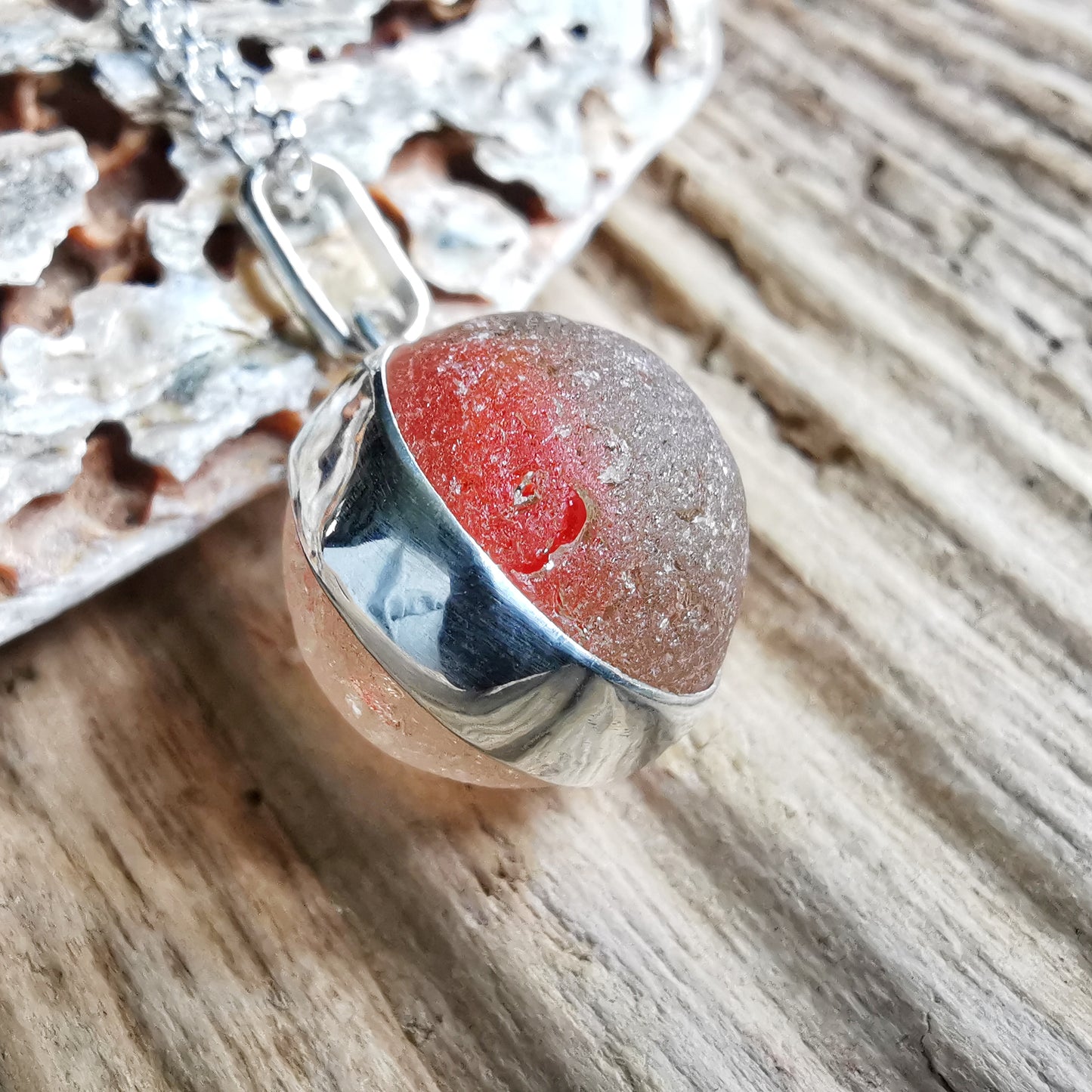 Scottish genuine orange sea glass marble & sterling silver pendant.