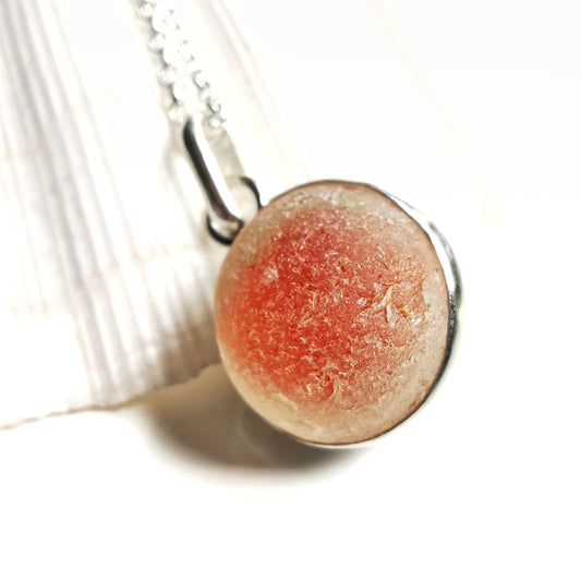 Scottish genuine orange sea glass marble & sterling silver pendant.