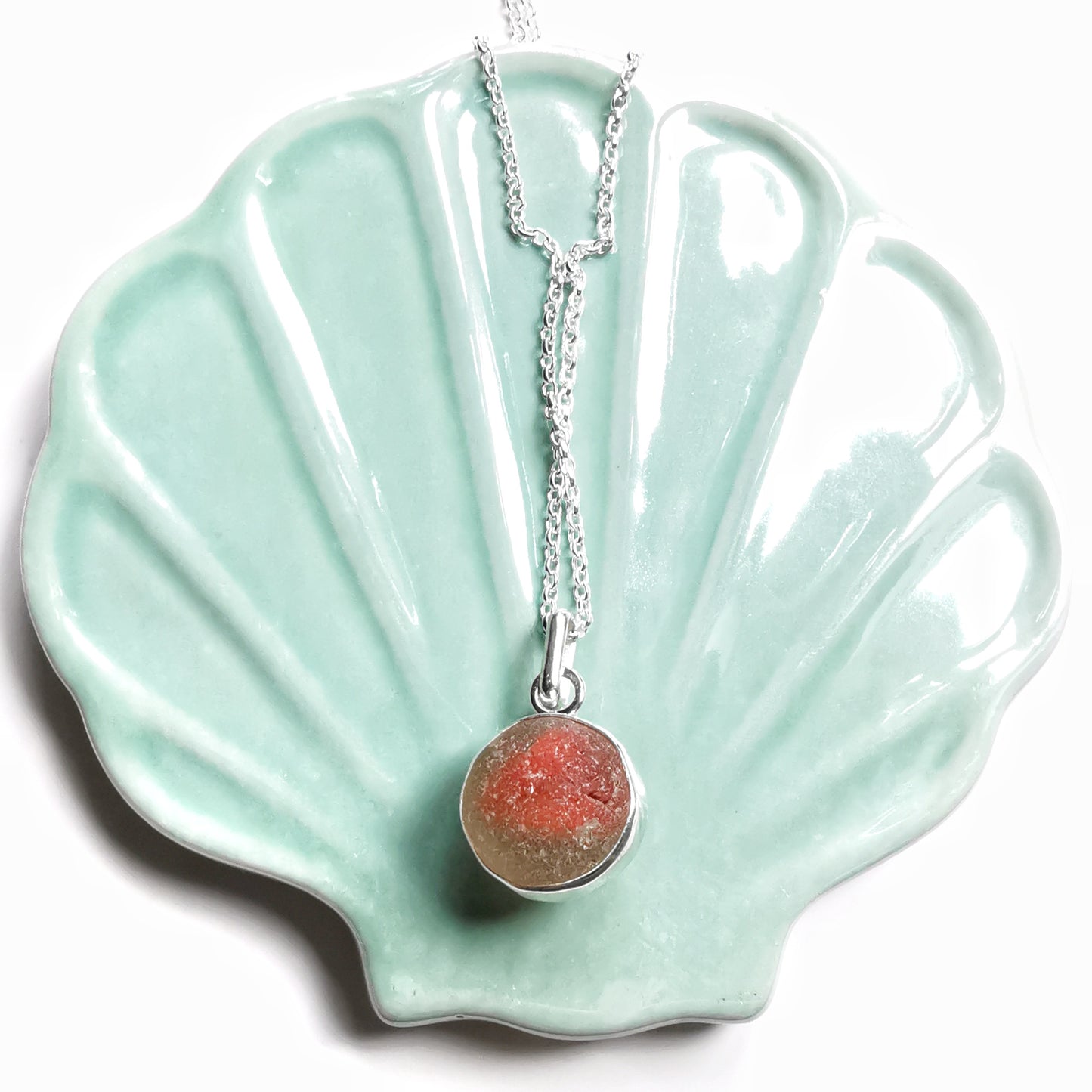 Scottish genuine orange sea glass marble & sterling silver pendant.